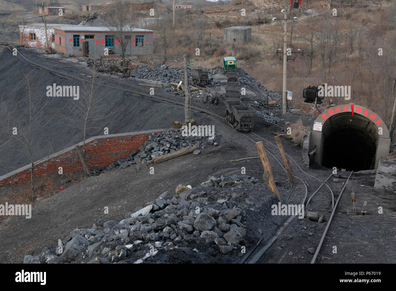 Small, localised coal mine near Nampio, Manchuria. 2005 Stock Photo