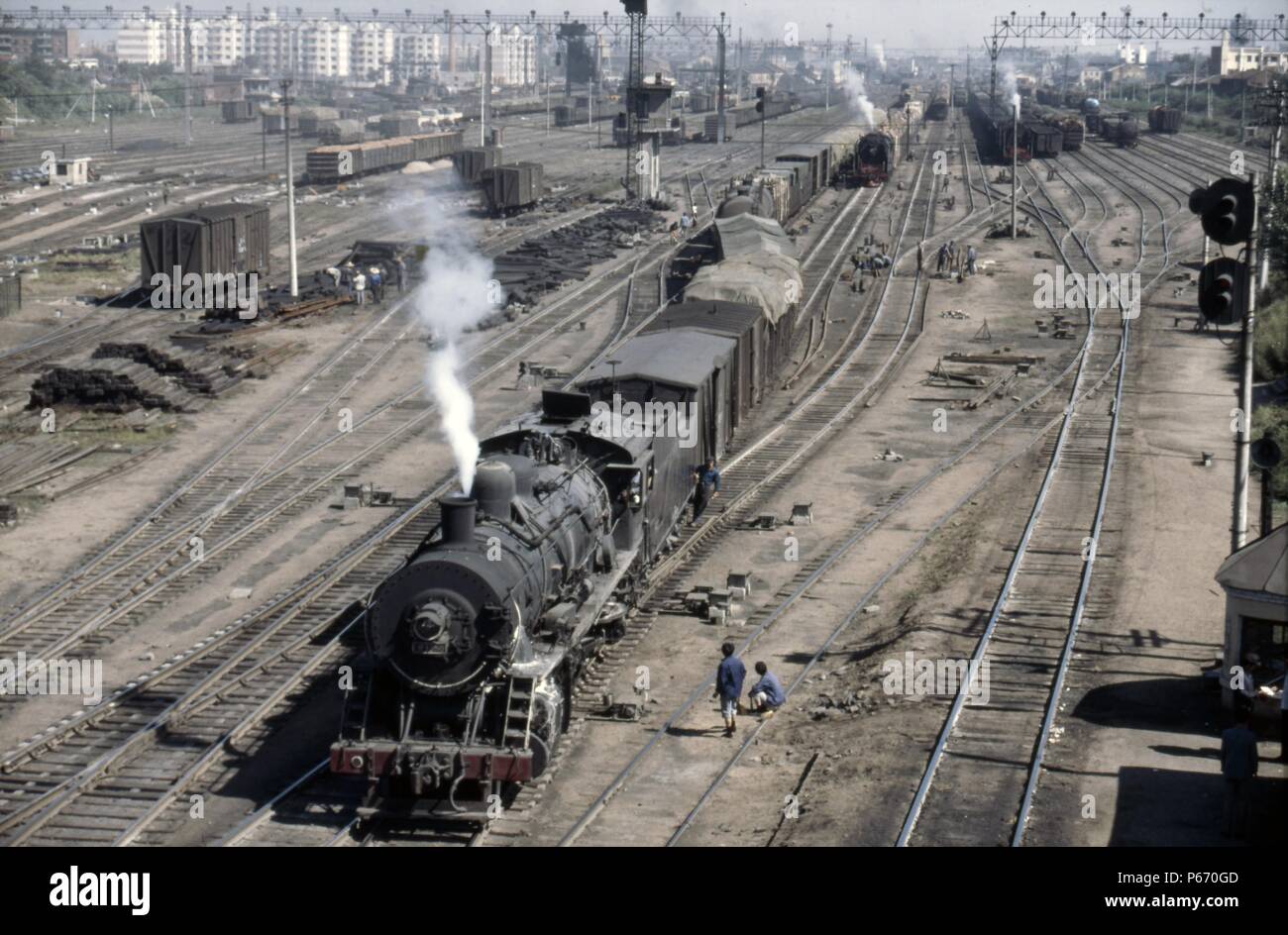 The huge marshalling and dump yard at Harbin is overhauled by Sankong Bridge known in the 1980s as the greatest trainwatching  place in the world. Hea Stock Photo