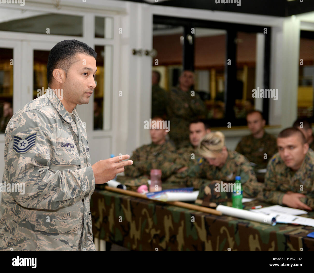 U.S. Air Force Tech. Sgt. Christopher Bautista, the NATO Headquarters Sarajevo legal advisor assistant, teaches a class on military discipline to 40 soldiers from the Bosnia and Herzegovina Armed Forces at the Rajlovac Barracks in Sarajevo, BiH, May 11, 2016. Sergeant Bautista was briefing as part of the AFBiH Primary Leadership Development Course, a five-week course designed to provide young soldiers with the knowledge and skills to be future NCOs. Sergeant Bautista is a Honolulu, Hawaii, native deployed from Seymour-Johnson Air Force Base, N.C. Stock Photo