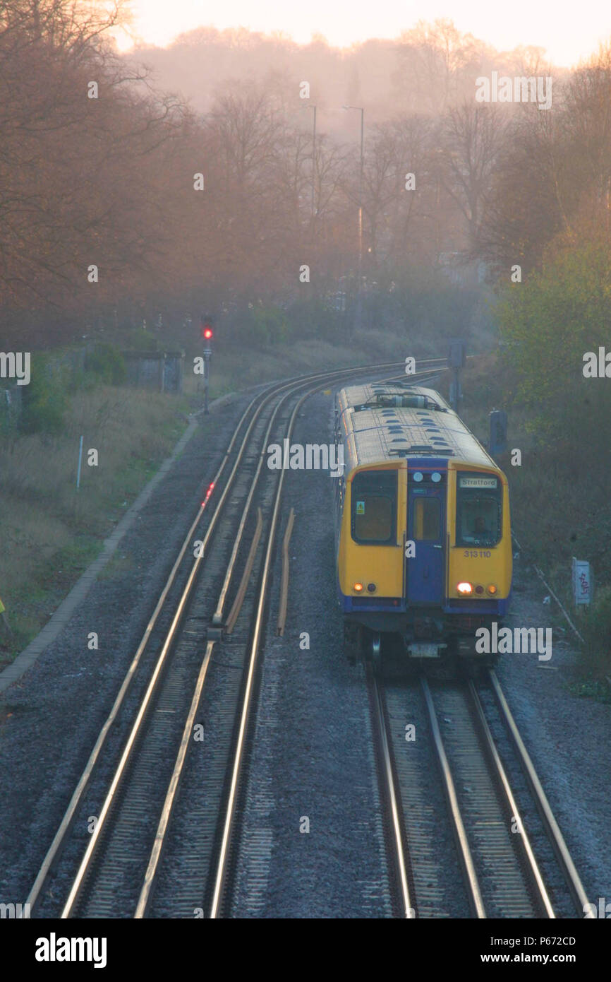 A Silverlink Metro train is seen here on the North London Line shortly after leaving Kew Gardens Station. 2004. Stock Photo
