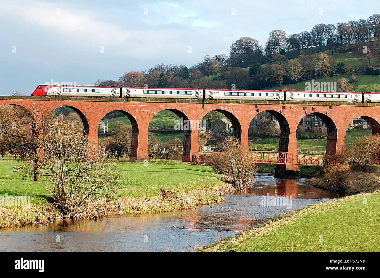 A Virgin Voyager crosses the viaduct at Whalley on the Settle and Carlisle Railway. 2004. Stock Photo