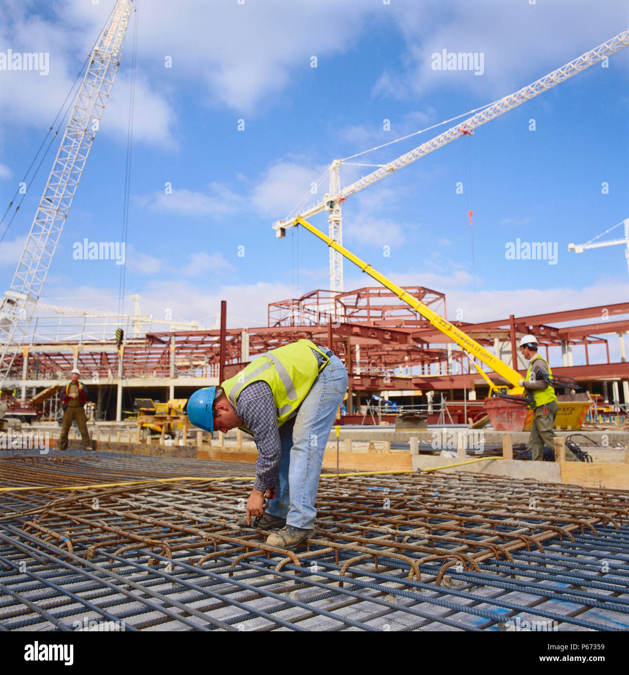 Worker fixing steel reinforcement on construction of Bluewater Shopping Centre  Kent Stock Photo