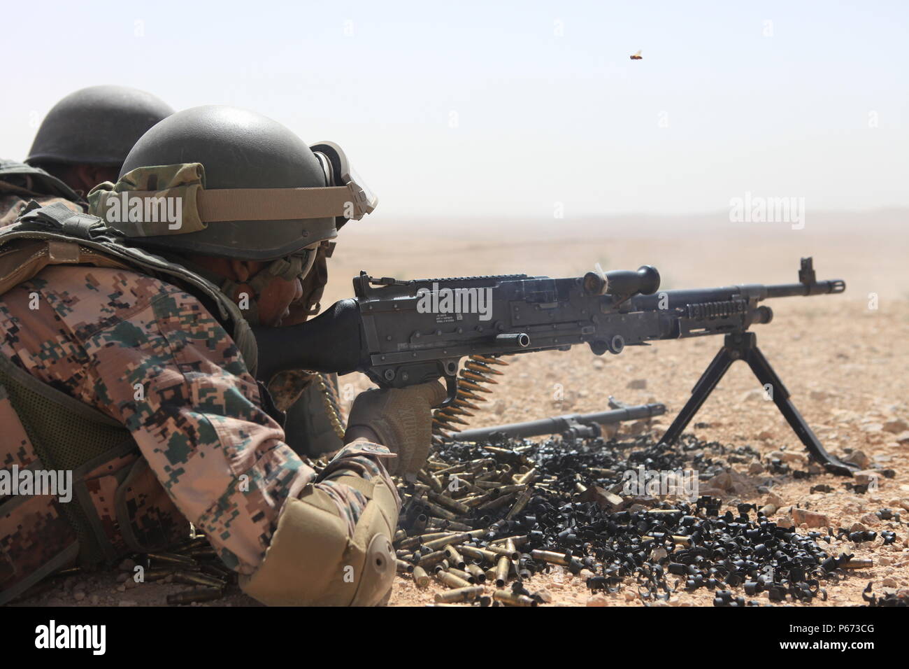 A member of the Jordanian Armed Forces fire a M240 Machine Gun at a quick  reaction force range during exercise Eager Lion 2016 (EL 16), May 17, 2016  at Al Zarqua, Jordan.