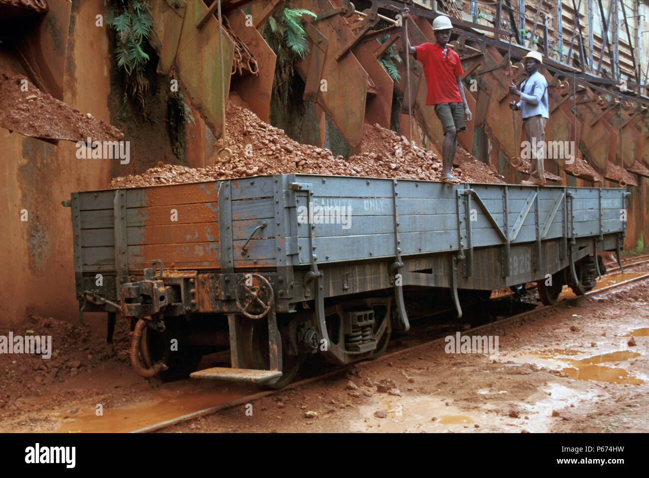 Loading Bauxite into wagons of Ghana Railways at Awaso Bauxite Mine on