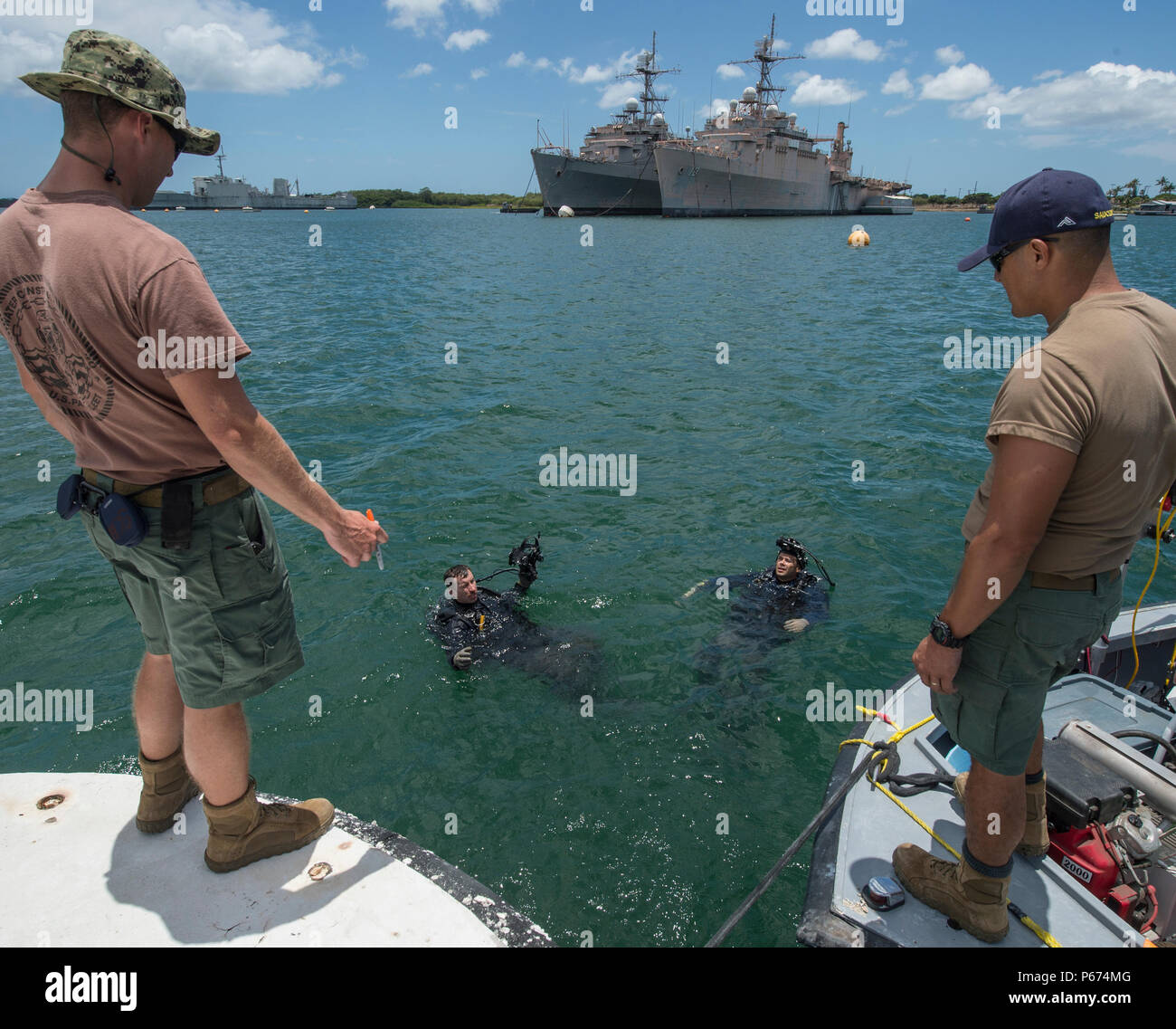Seabee divers with Underwater Construction Team (UCT) 2 Construction