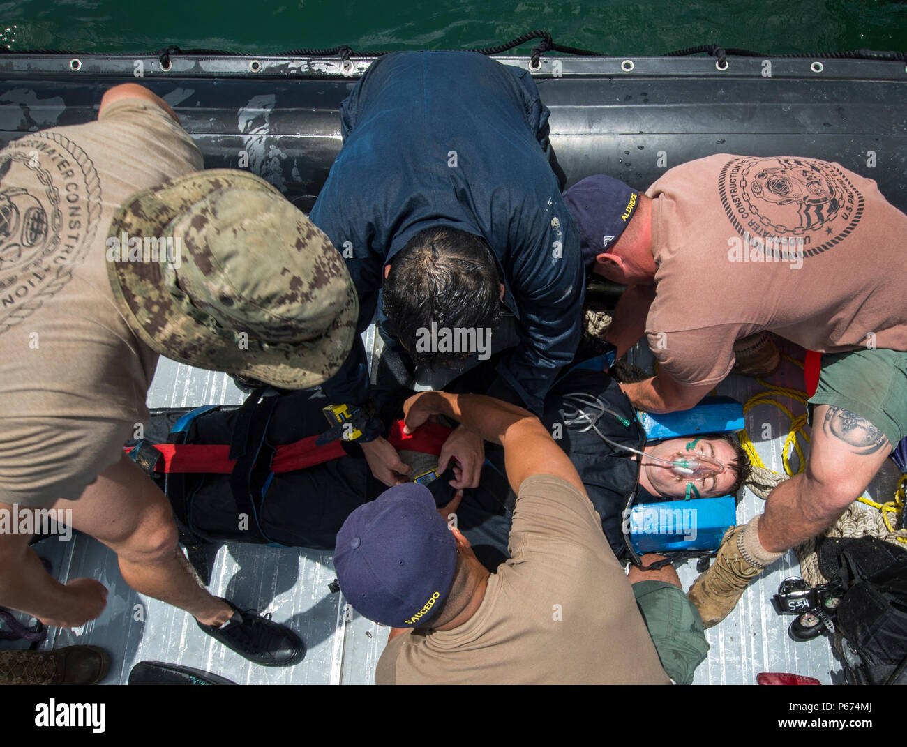 Seabee divers with Underwater Construction Team (UCT) 2 Construction