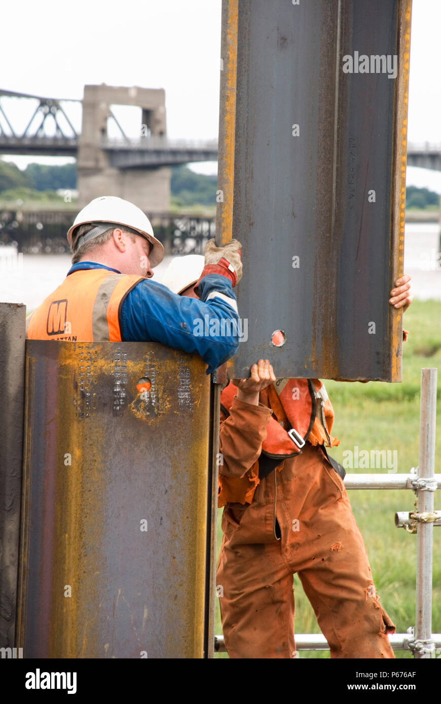 Construction of the cofferdams on the south shore of the river Forth, Scotland Stock Photo