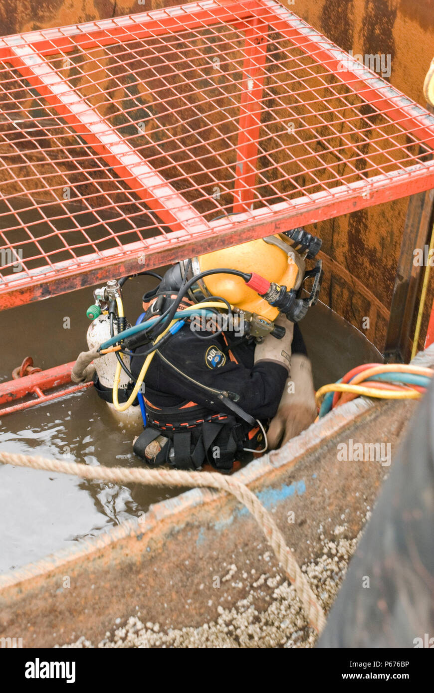 The 2 temp piers had to be cut at river bed level by Divers, this was a tuff job as visibility was poor and the confined space. Stock Photo