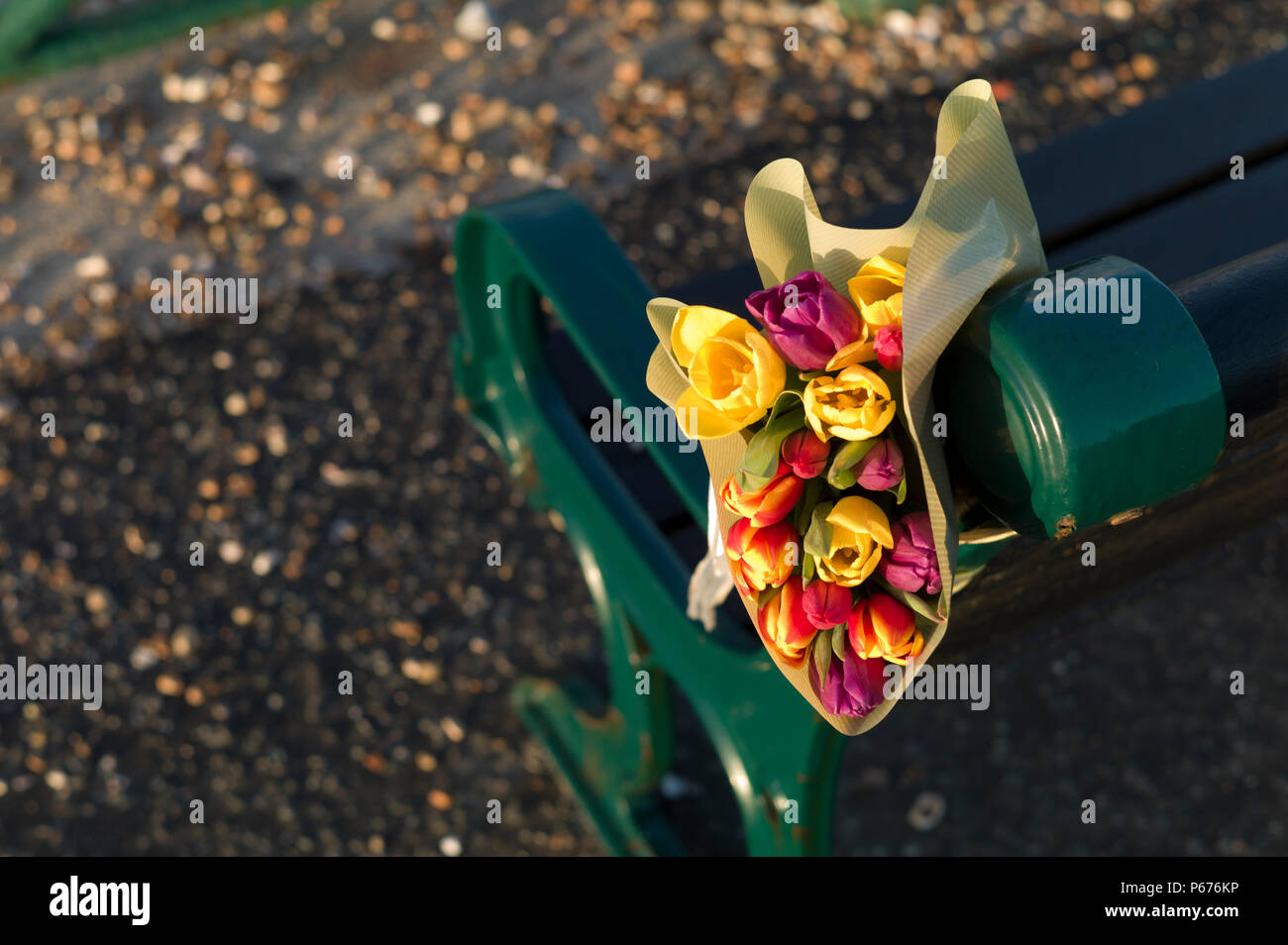 Memorial flowers tied to bench, Brighton Stock Photo Alamy