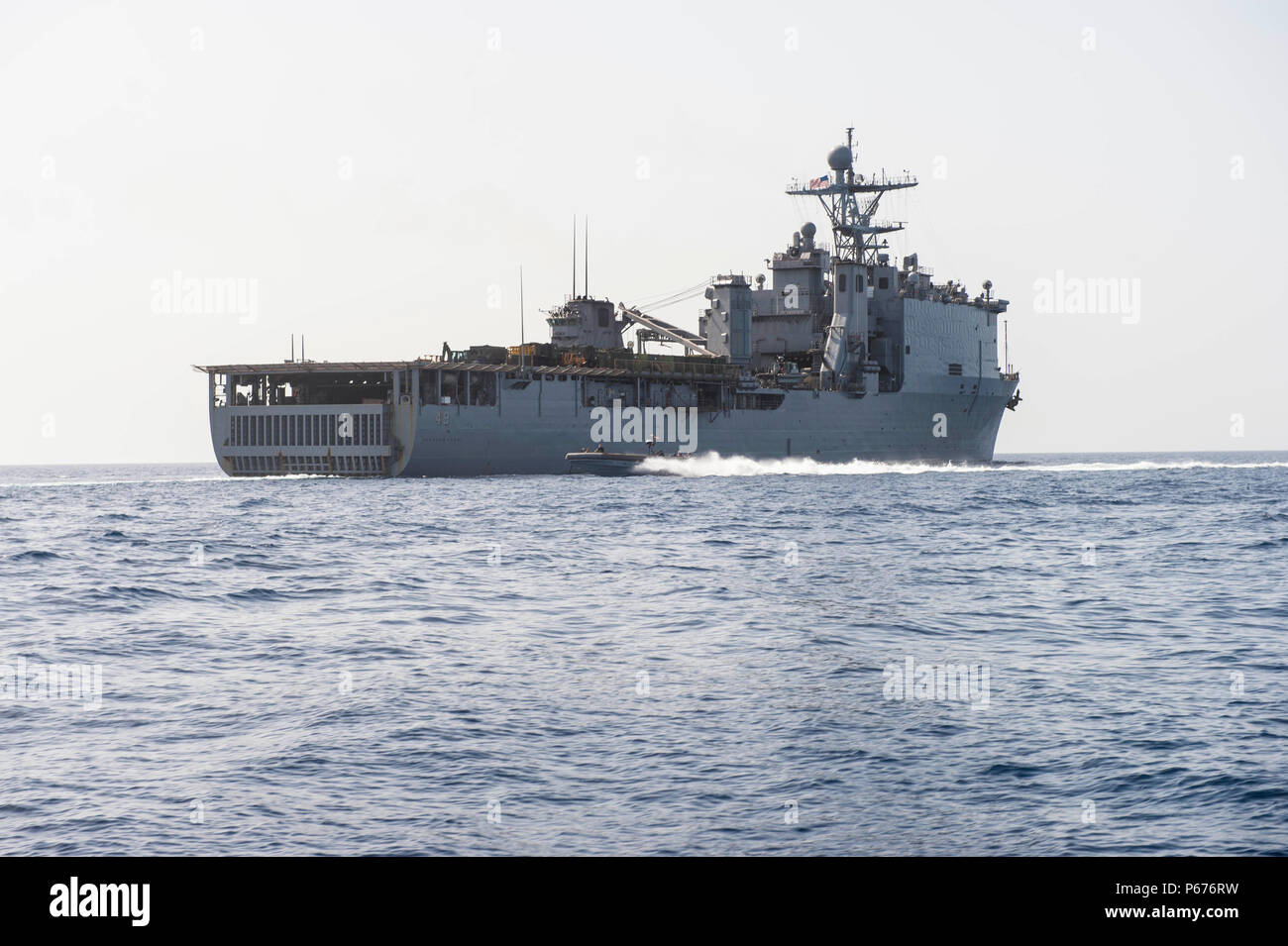 160516-N-VS214-172  RED SEA (May 16, 2016) An 11-meter rigid hull inflatable boat performs a horseshoe maneuver around the dock landing ship USS Harpers Ferry (LSD 49) during a small boat training exercise. The crew of Harpers Ferry is part of about 3,000 U.S. military personnel – representing USCENTCOM headquarters and its components – who will participate in this year’s bilateral exercise, exercise Eager Lion 16, with the Jordan Armed Forces. (U.S. Navy photo by Mass Communication Specialist 3rd Class Zachary Eshleman/Released) Stock Photo