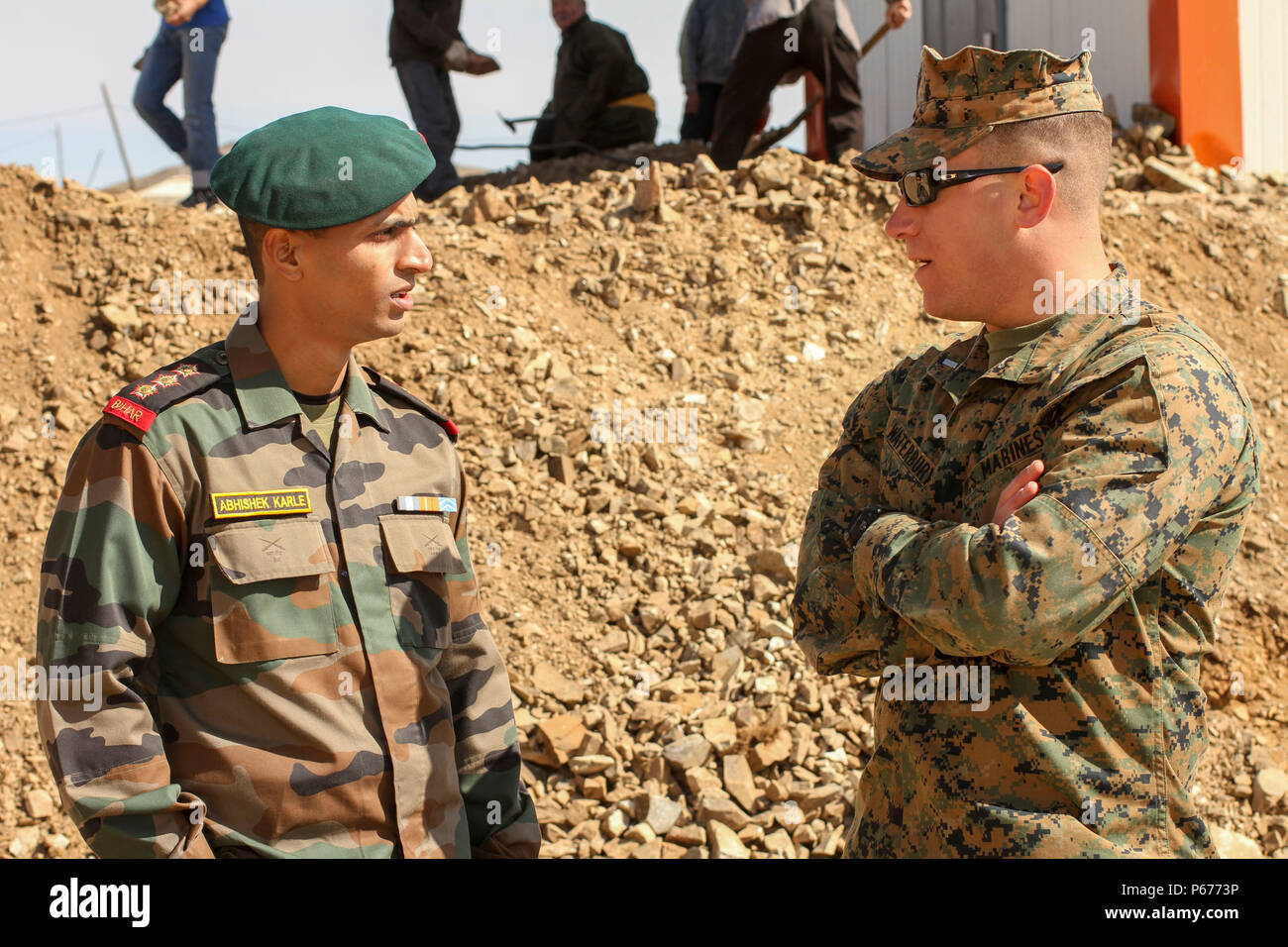 Indian Army Capt. Abhushek Karle, left, assigned to Infantry 