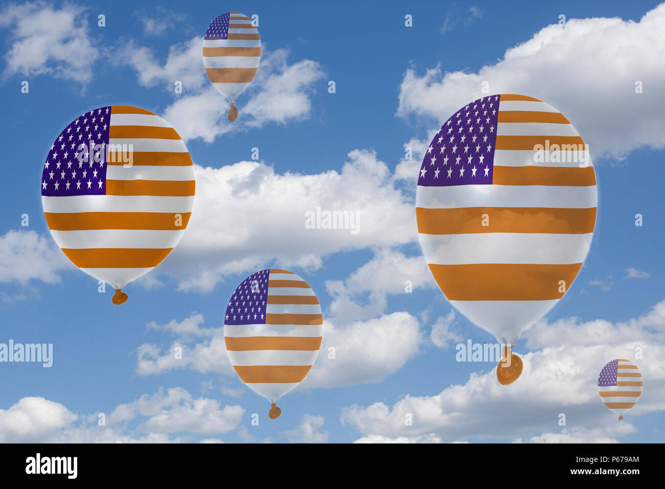 Inflatable balloons with USA flag in blue sky and clouds closeup Stock Photo