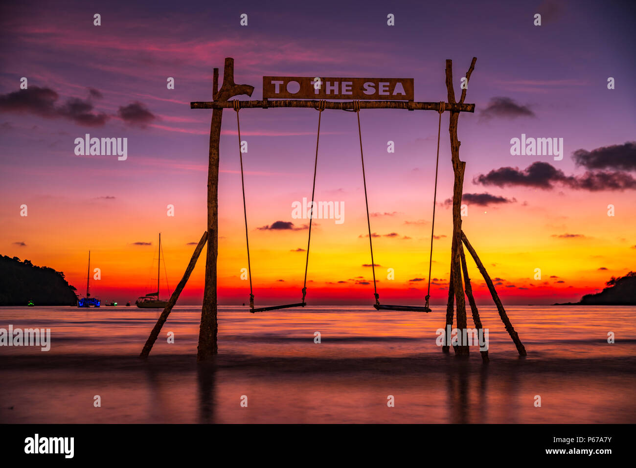 Amazing sunset over the tropical beach Stock Photo - Alamy