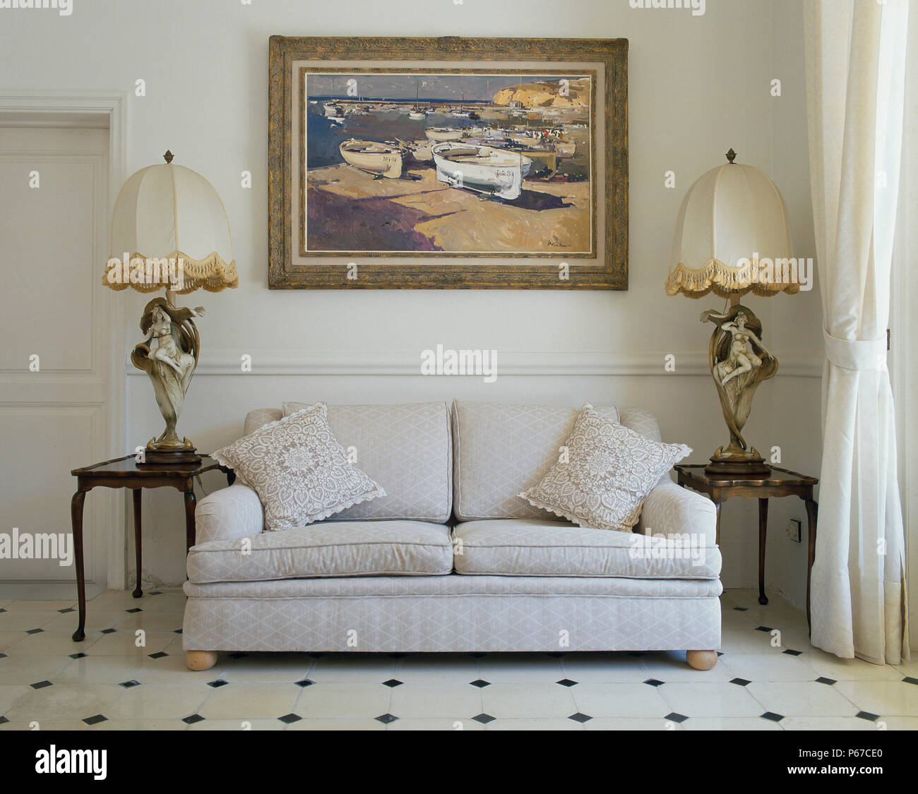 View of an artistic painting above a couch Stock Photo Alamy