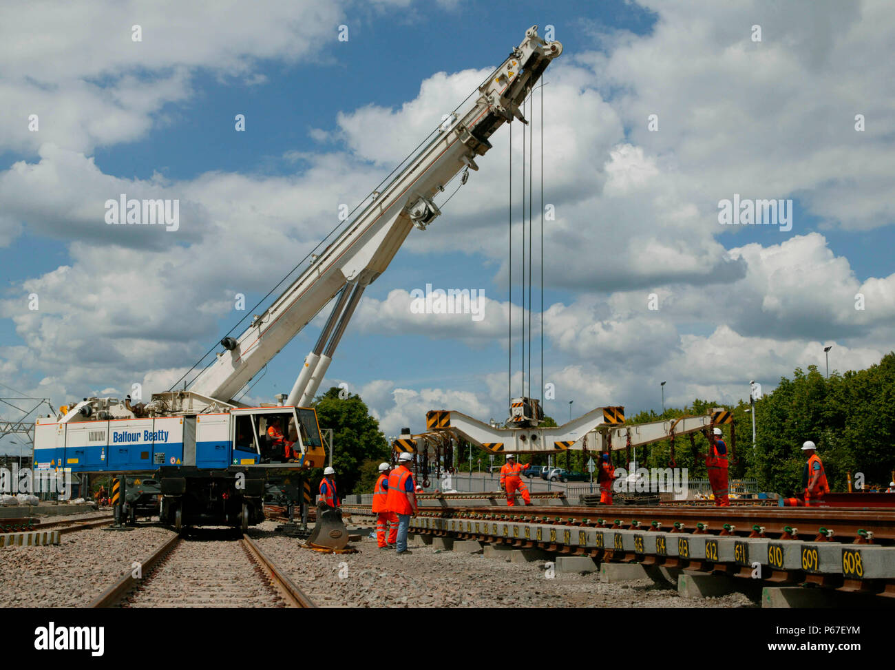 Balfour Beatty's Kirov Crane lifting track panels at Tring station. On Bank holiday Monday 31st May 2004 during the upgrading of the West Coast Main L Stock Photo