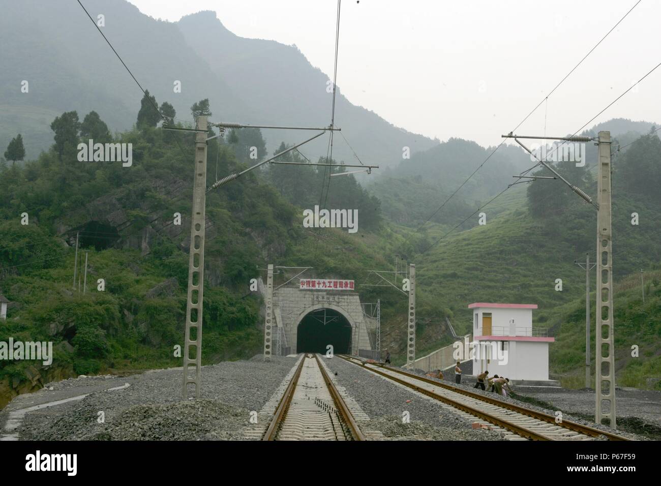 Building the new railway between Jinzhou and Qinghuangdao. Huangcao station and tunnel. August 2005. Stock Photo