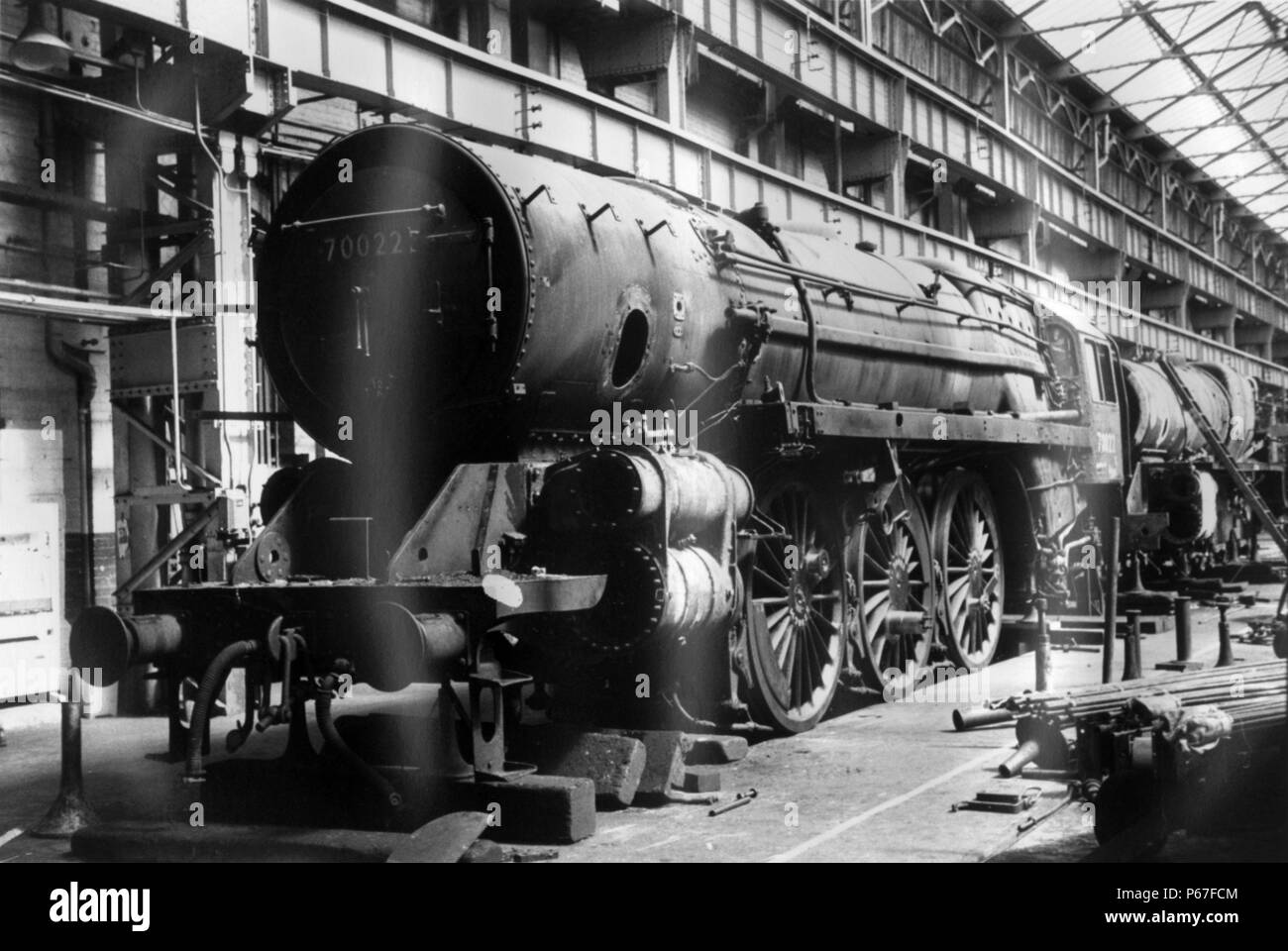 Crewe Works erecting shop with Britannia 70022 'Tornado' undergoing overhaul. Stock Photo