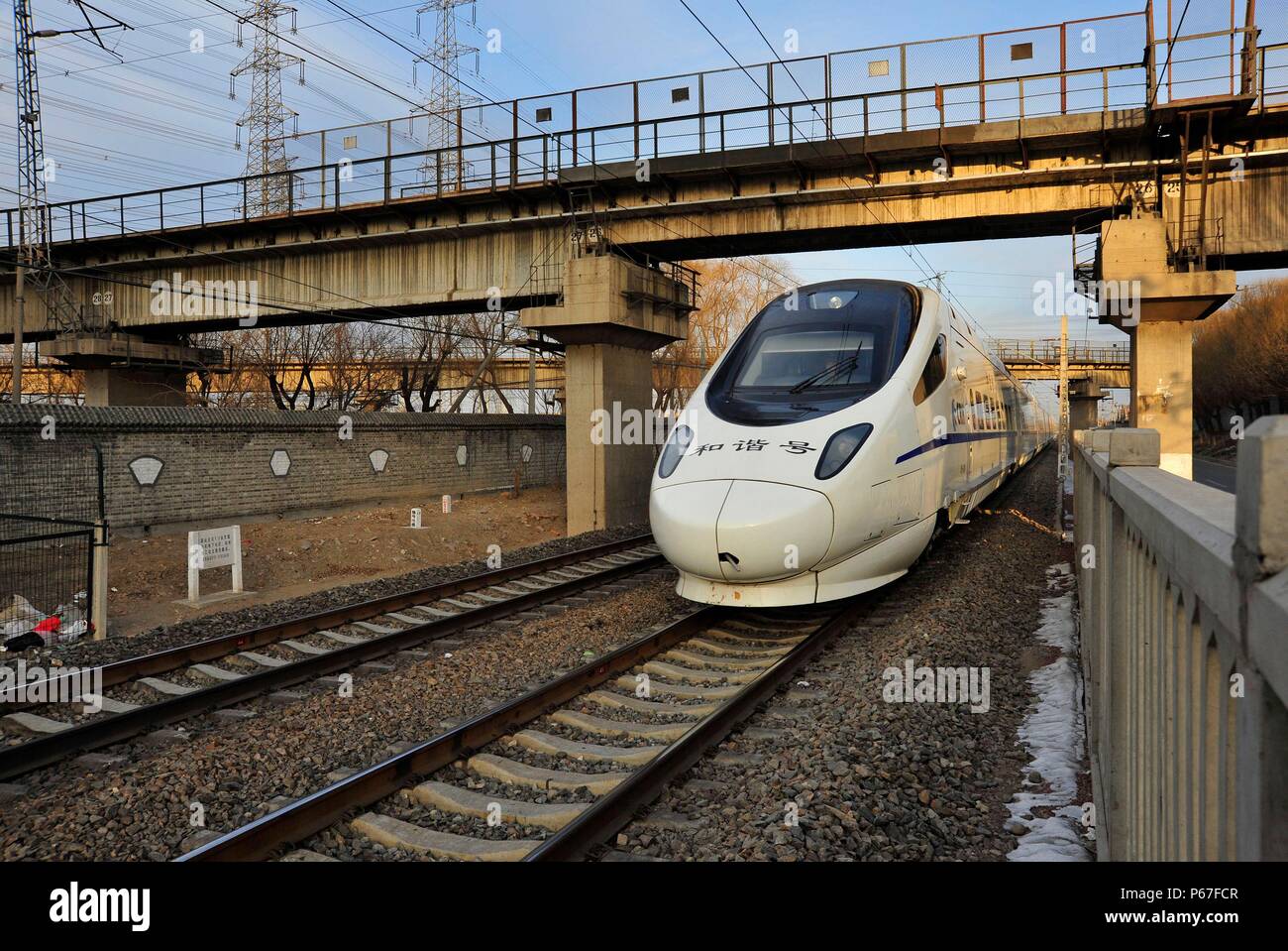 CRH 5 class electric multiple unit approaching Beijing with a service from Northeast China. 14th February 2010. Stock Photo