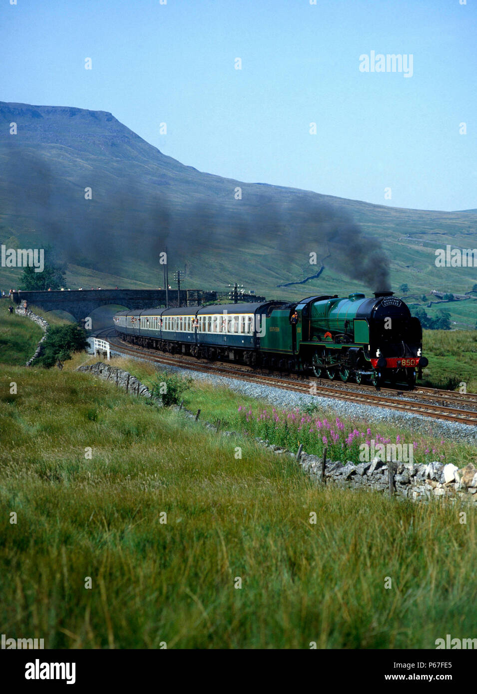 Cumbrian Mountain Express.No. 850 Lord Nelson heads south at Ais Gill summit. Wild Boar Fell in background. 03.06.1987. Stock Photo