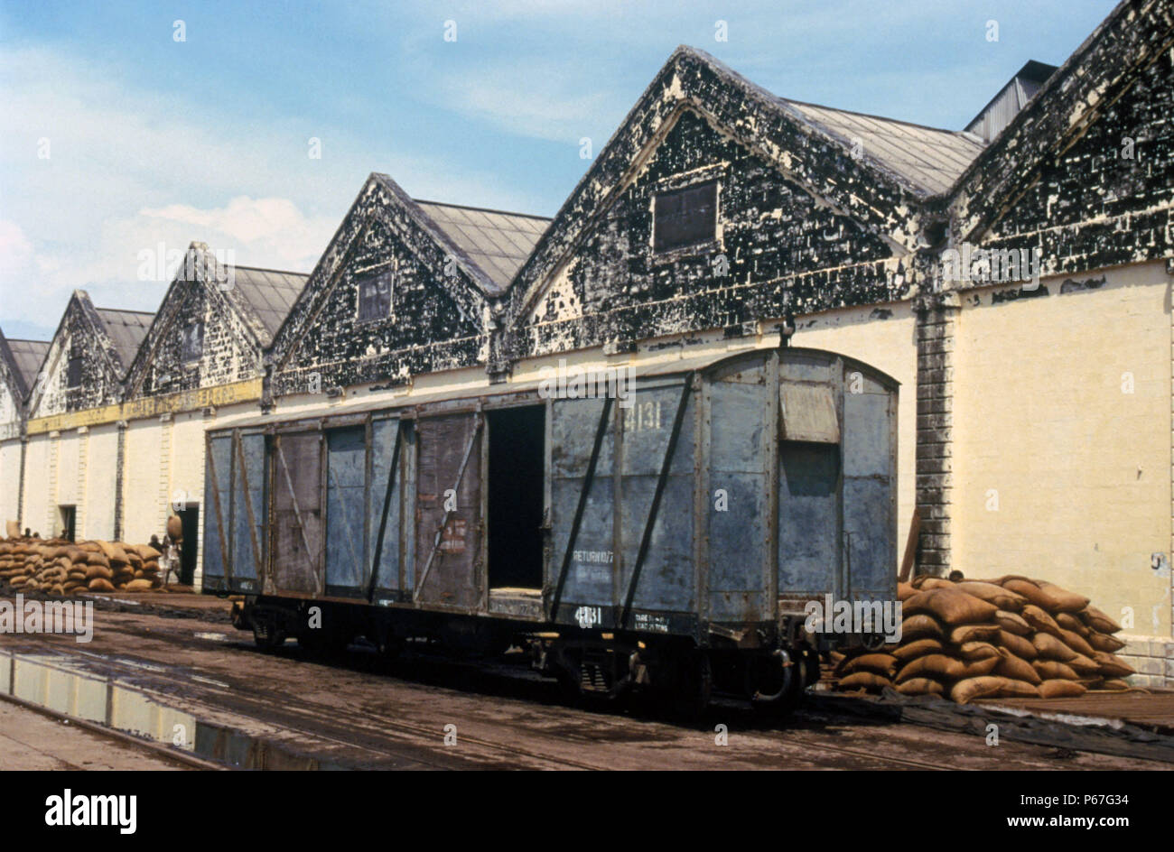 Ghana Cocoa Marketing Wharf at Takoradi on Thursday 6 June 1985. The sacks of beans which come in by rail are visible behind the box car. Thursday 6 J Stock Photo