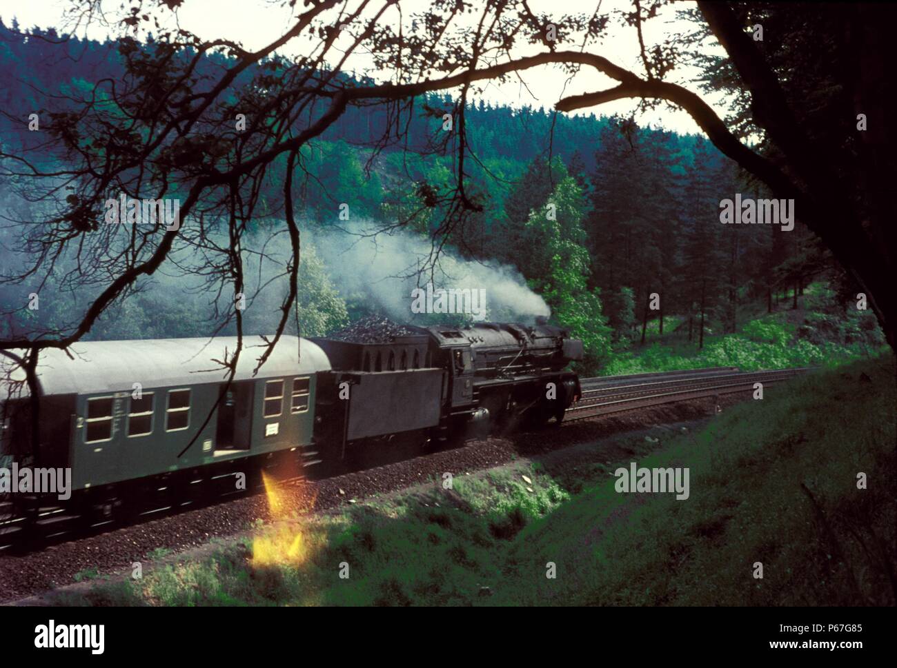 Hot Box' Sparks issuing from an overheated axle on a German passenger train. Stock Photo