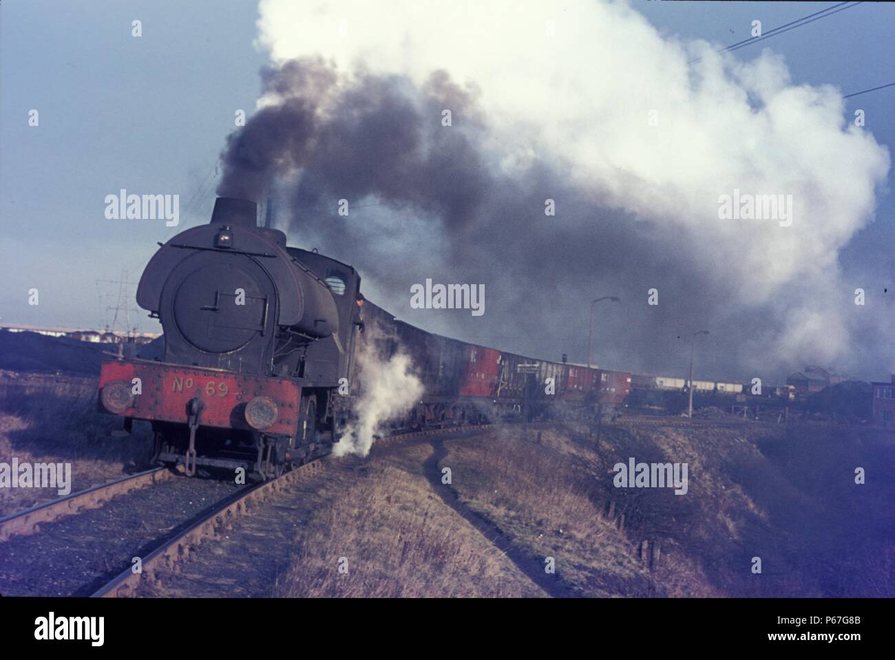 Hunslet Austerity 0-6-0ST No.69 in National Coal Board service. The unusual shape of the chimney indicates that this locomotive has been modified with Stock Photo