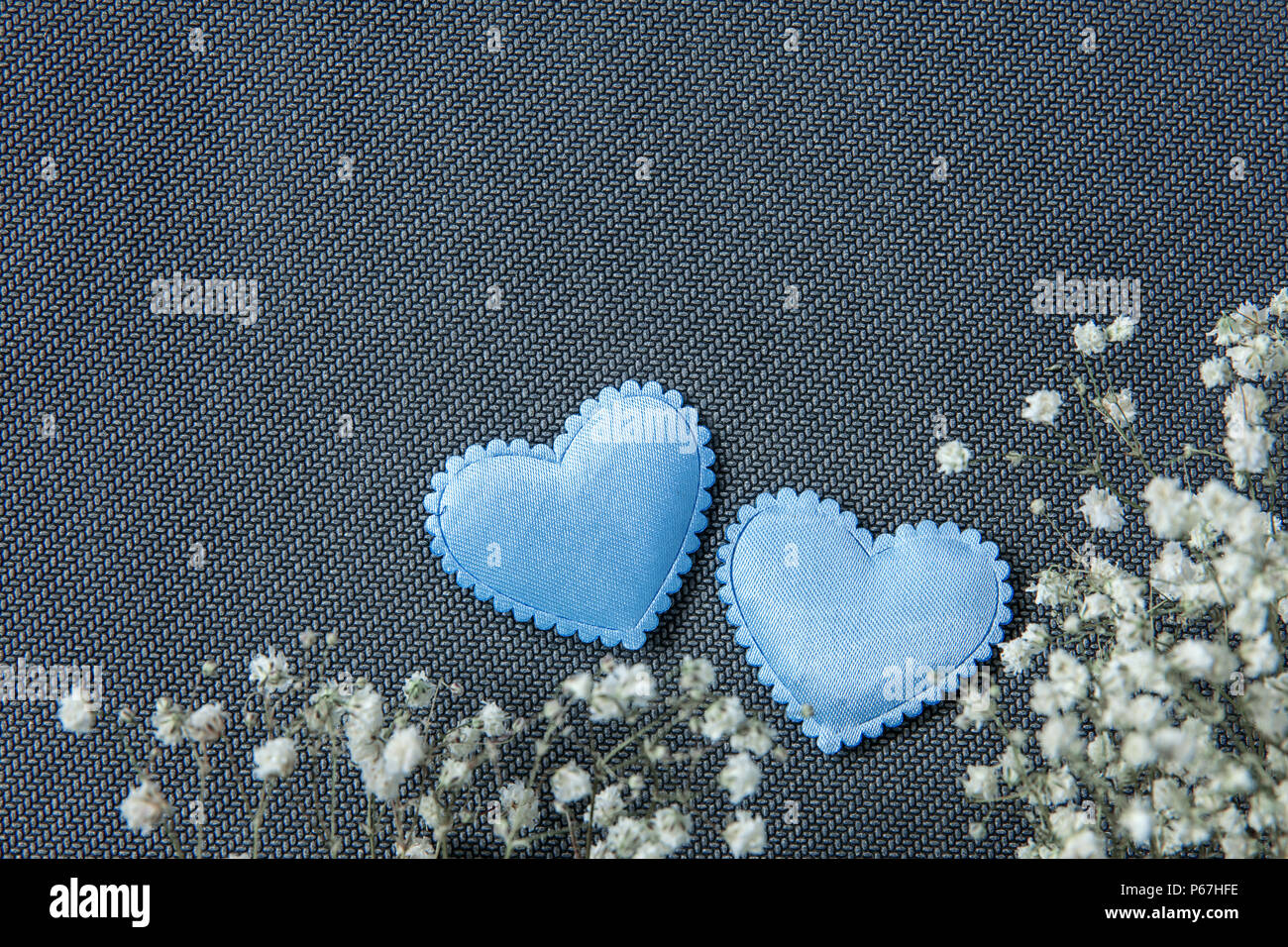 Hearts and beautiful flowers on grey background Stock Photo