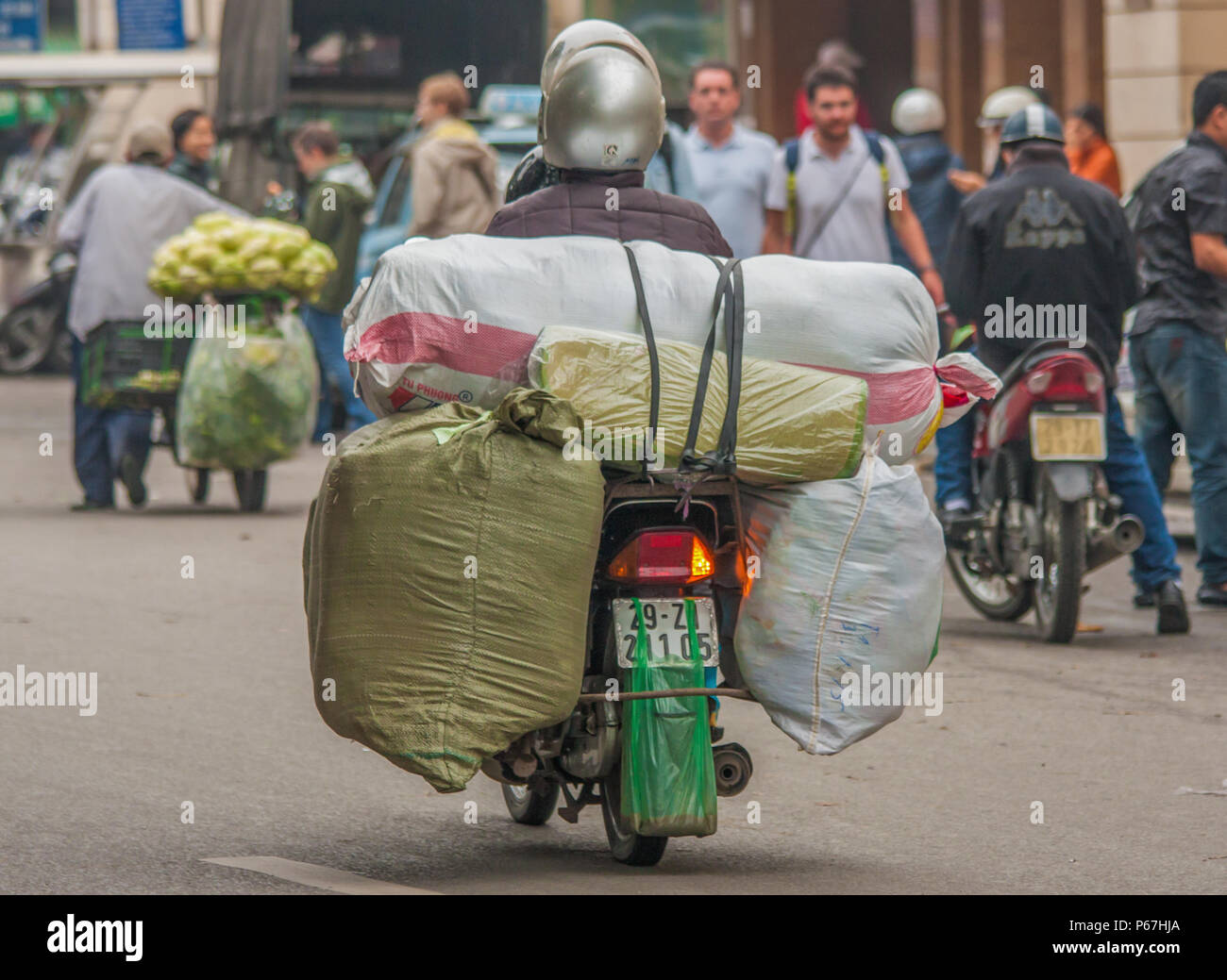 Hanoi, Vietnam since cars are expensive and the traffic crazy, in