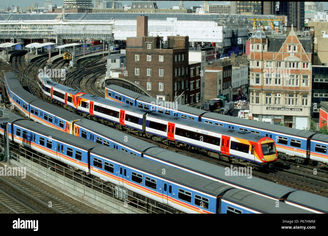 The new livery of a pair of SWT's new Turbostar units is in contrast with the modified Network South East livery adopted when SWT first became the TOC Stock Photo