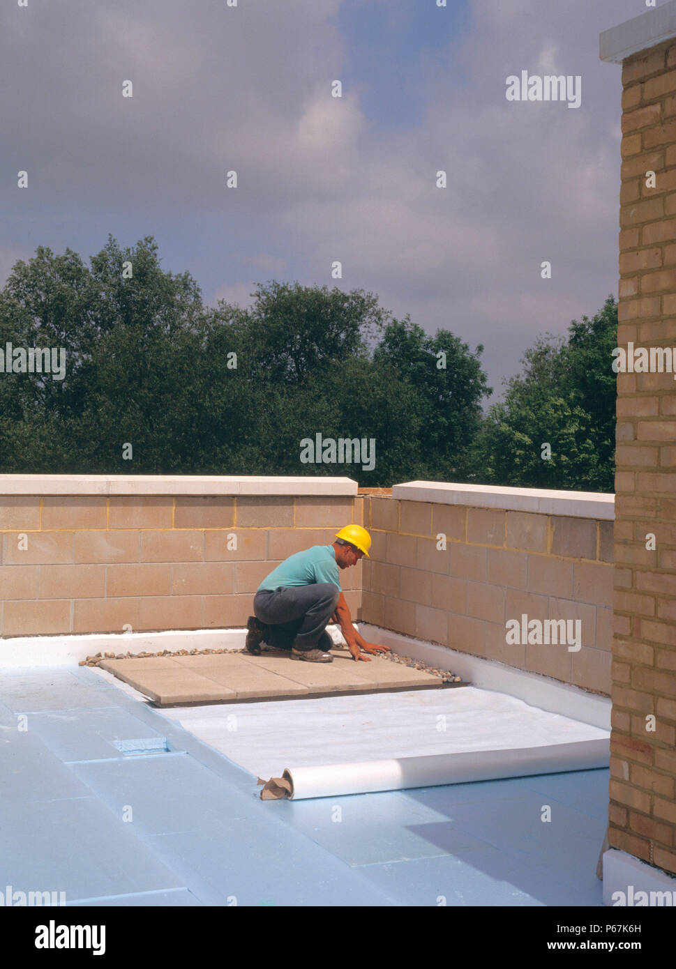 Insulating on flat roof. Stock Photo