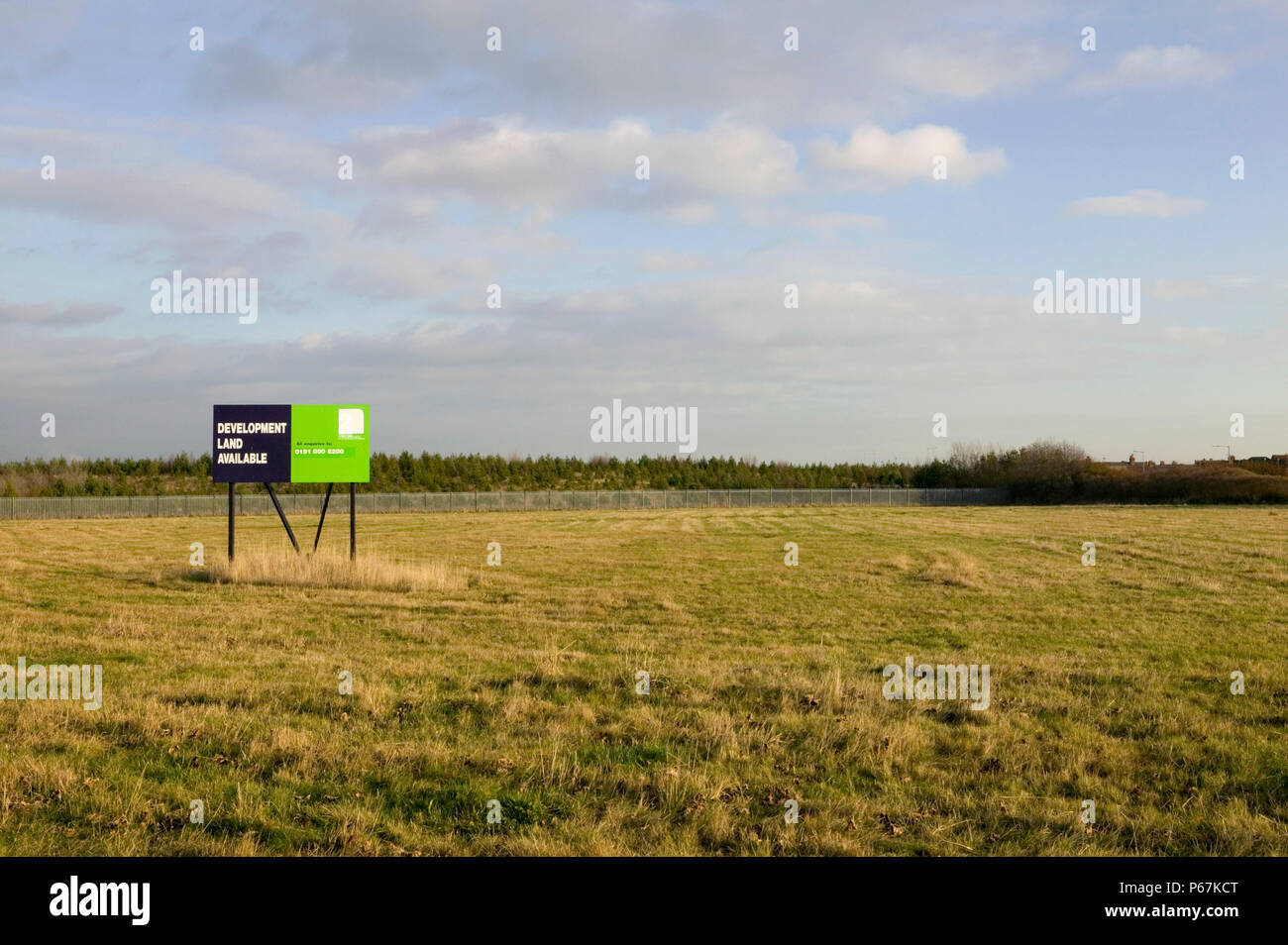 Brownfield site advertised for new land development Stock Photo Alamy