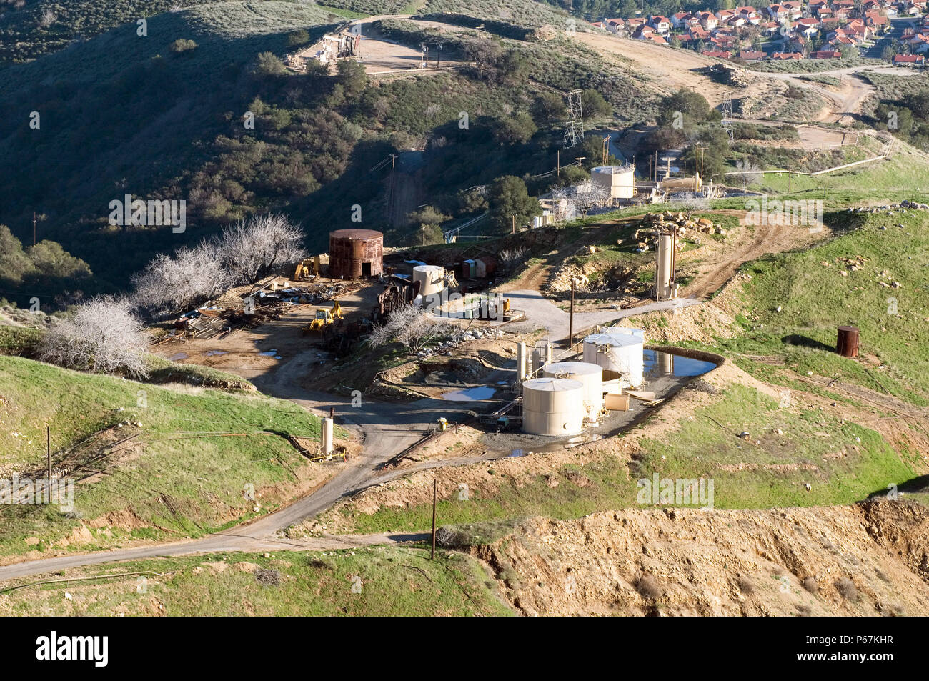 Aerial view of oil drilling rigs in the hills of Los Angeles