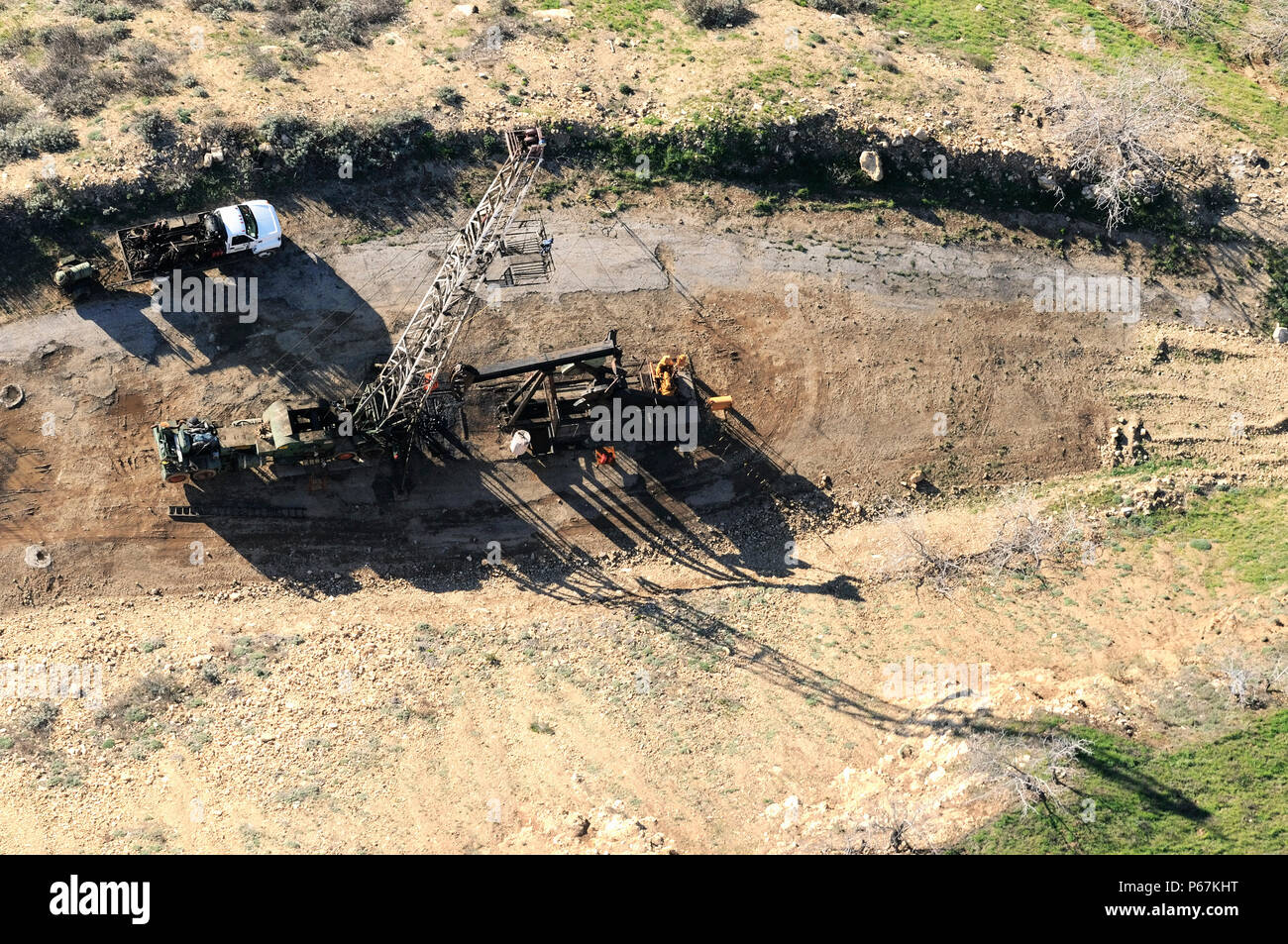 Aerial view of oil drilling rigs in the hills of Los Angeles