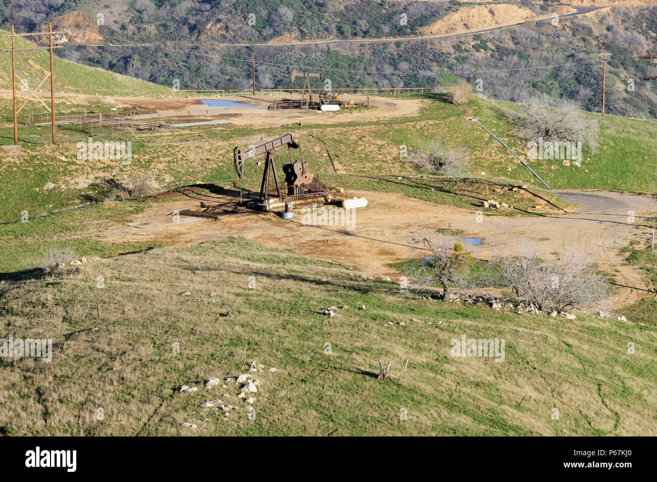 Aerial view of oil drilling rigs in the hills of Los Angeles