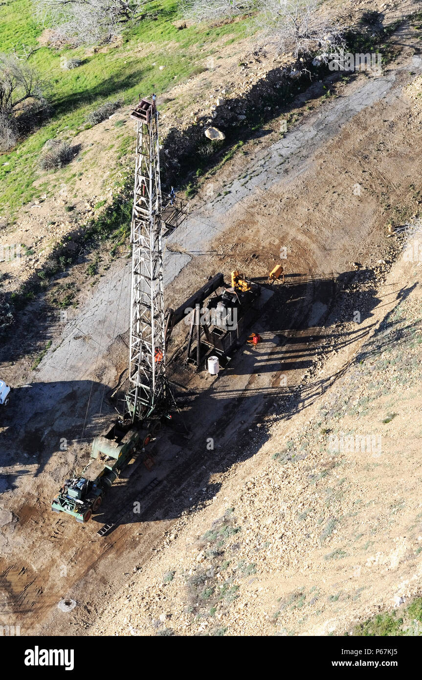 Aerial view of oil drilling rigs in the hills of Los Angeles