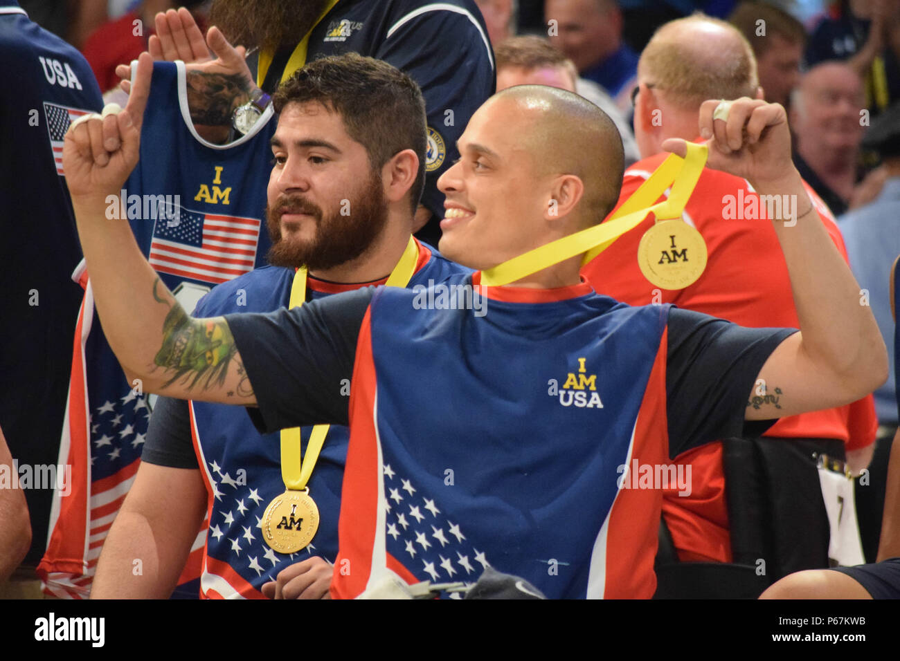 Navy Fire Controlman 3rd Class (ret.) Jason Reyes celebrates after ...