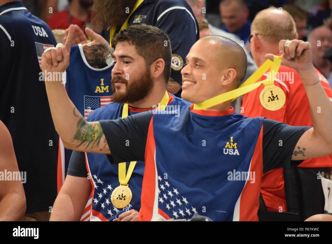 Navy Fire Controlman 3rd Class (ret.) Jason Reyes celebrates after ...