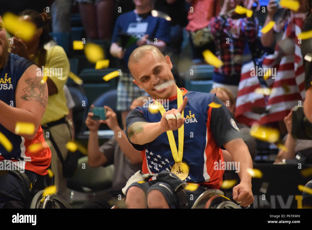 Fire Controlman 3rd Class (ret.) Jason Reyes celebrates after winning ...