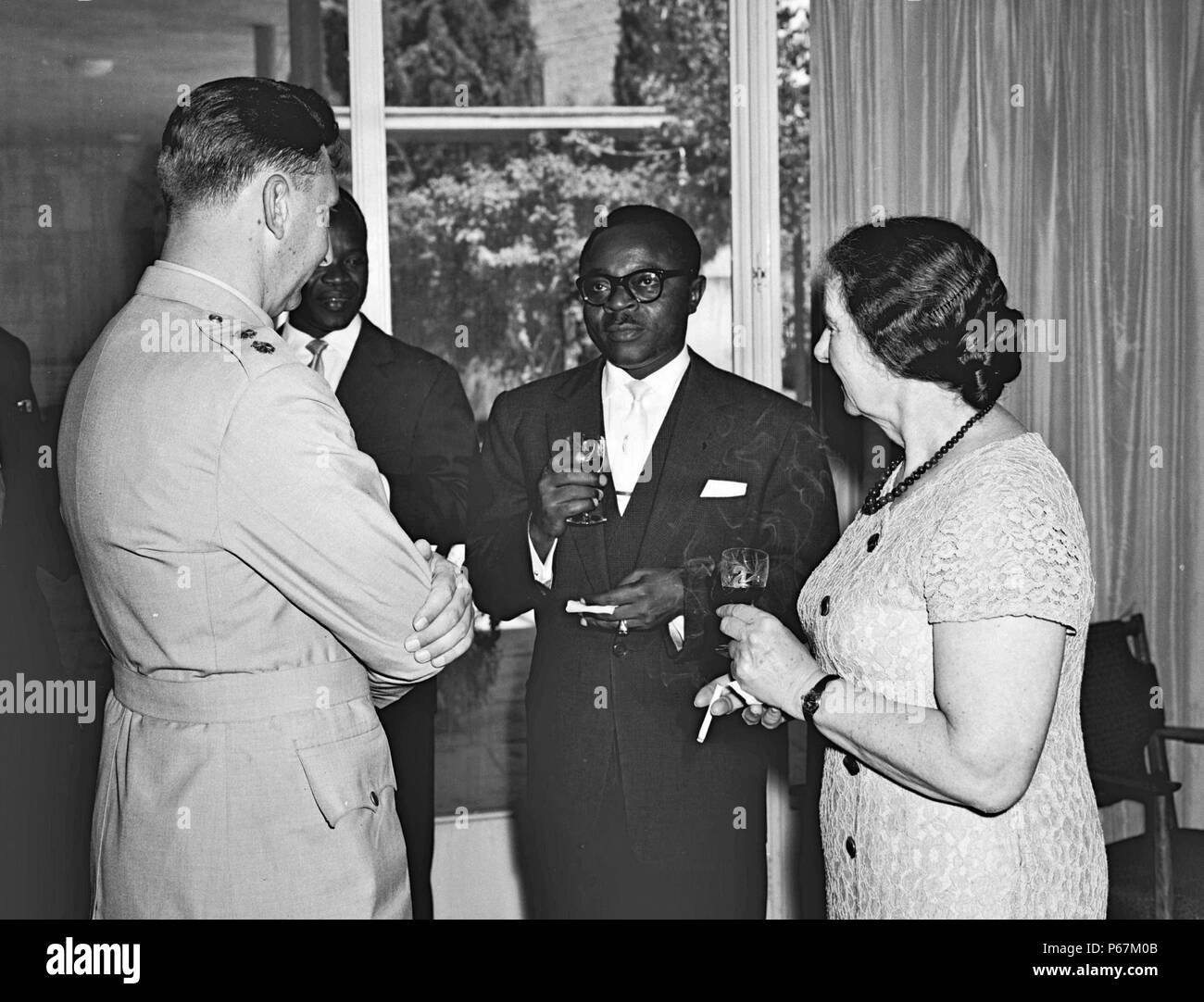 Photograph of Maurice Yaméogo (1921- 1993) meeting with Golda Meir (1898-1978) before a Luncheon in his honour. Dated 1961 Stock Photo