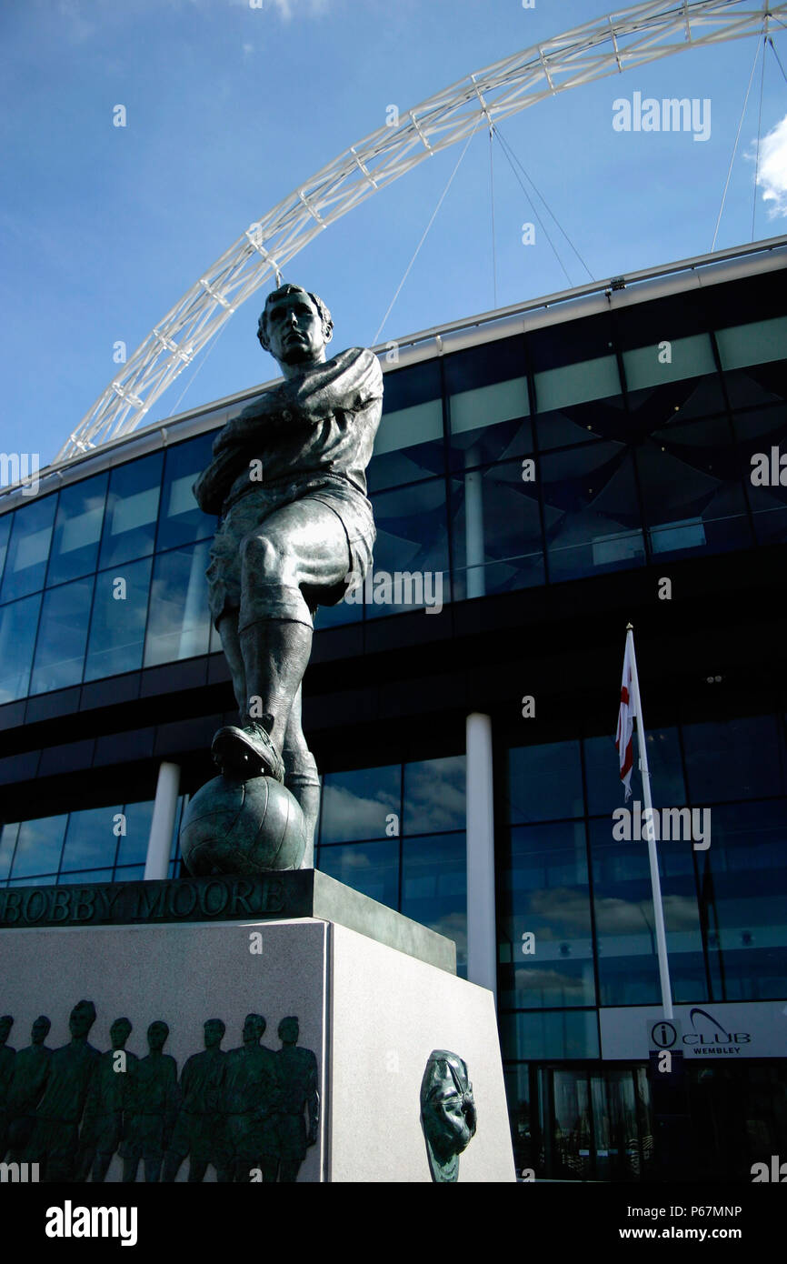 Statue of Bobby Moore outside Wembley Stadium. Wembley Stadium was designed by architects HOK