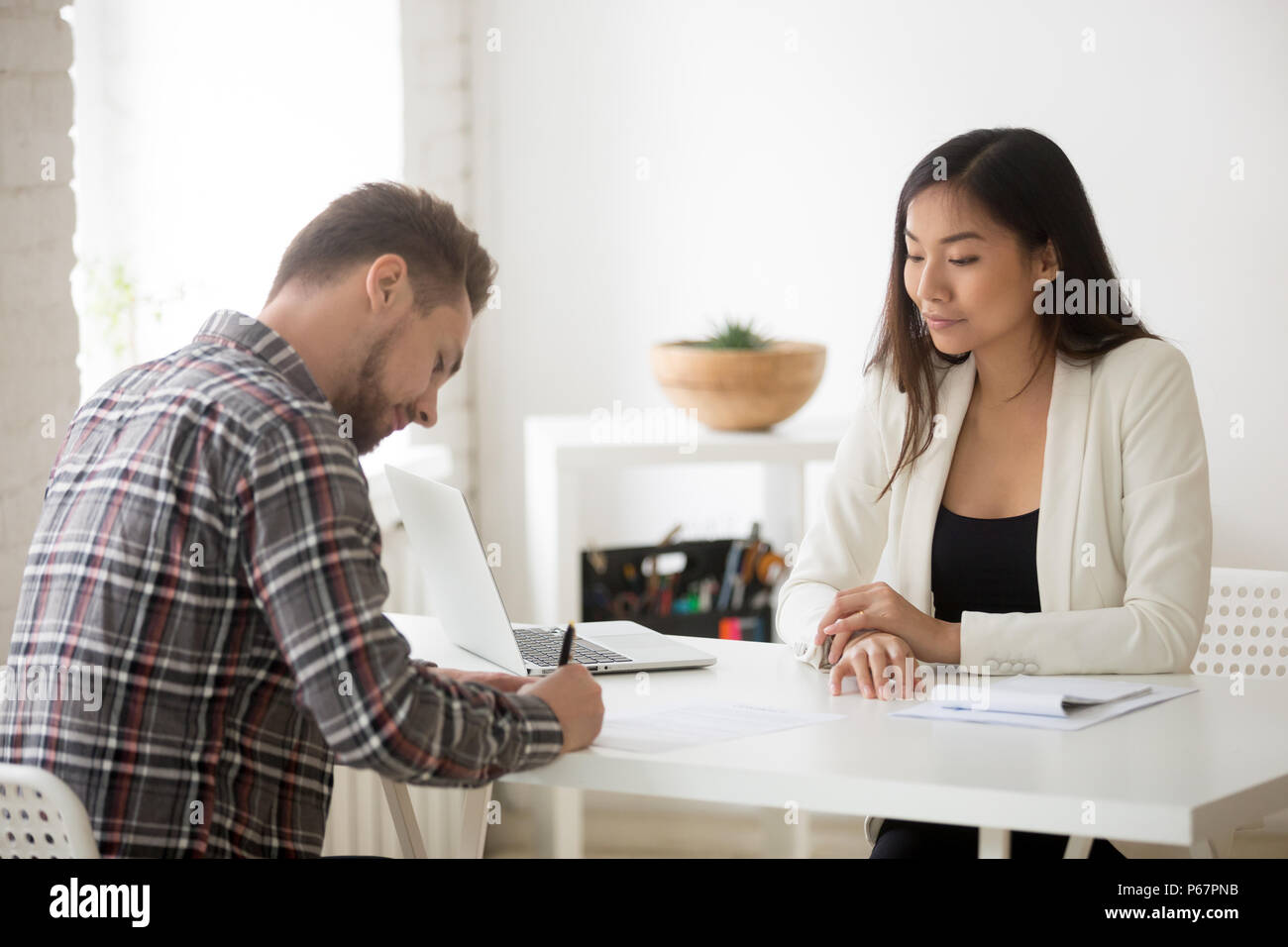Signing Work Male job candidate signing work contract after successful interv Stock ...