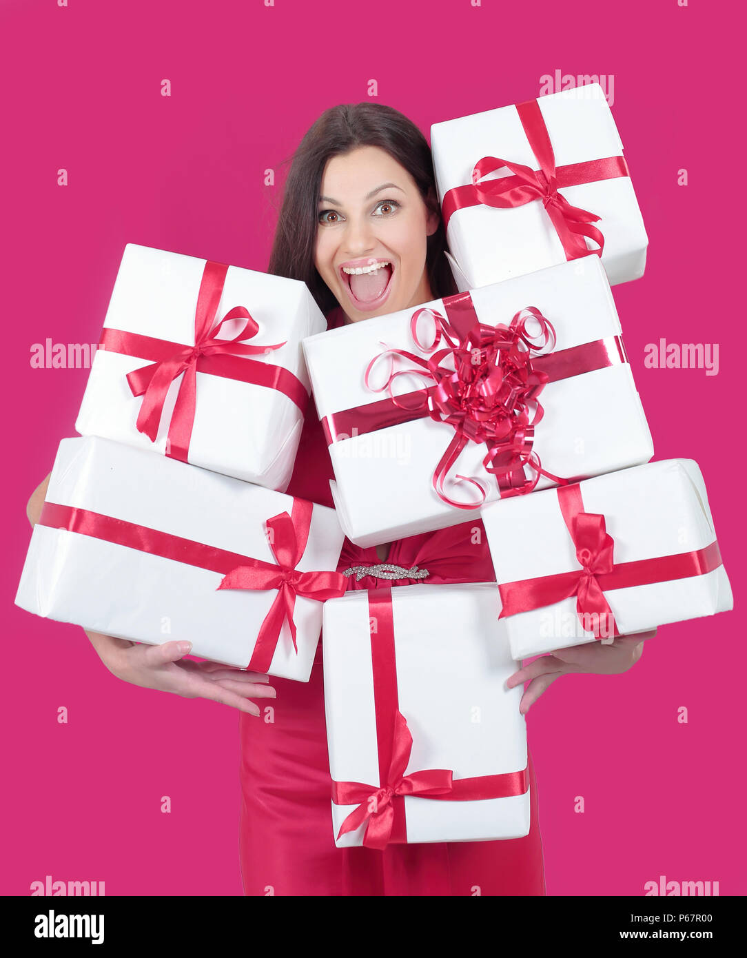 happy pretty woman holding many boxes with presents Stock Photo - Alamy