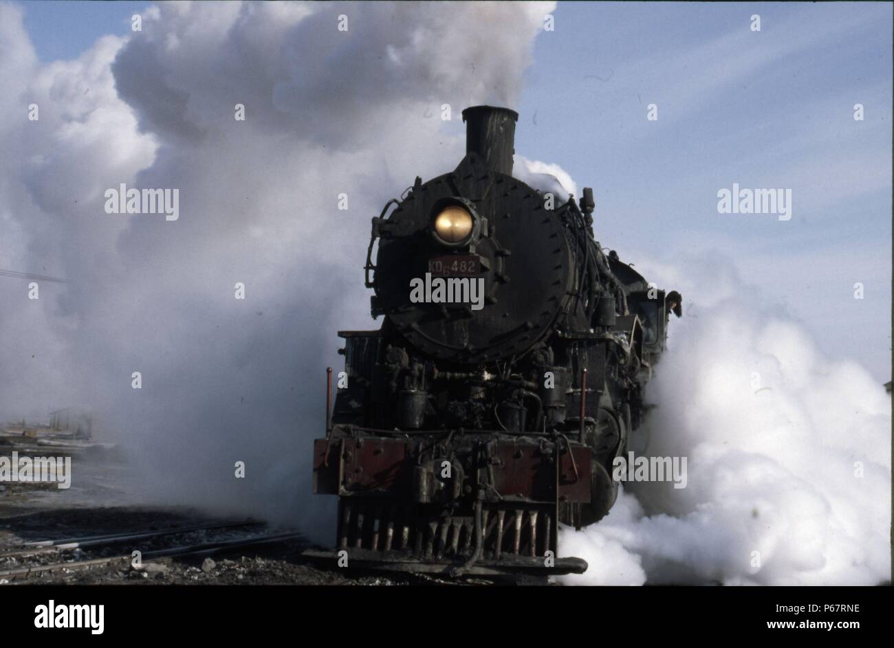 One of the classic United States Army Transportation Corps S160 Class 2-8-0s pensioned off into coalfield service at Manzouli on China's Russian borde Stock Photo