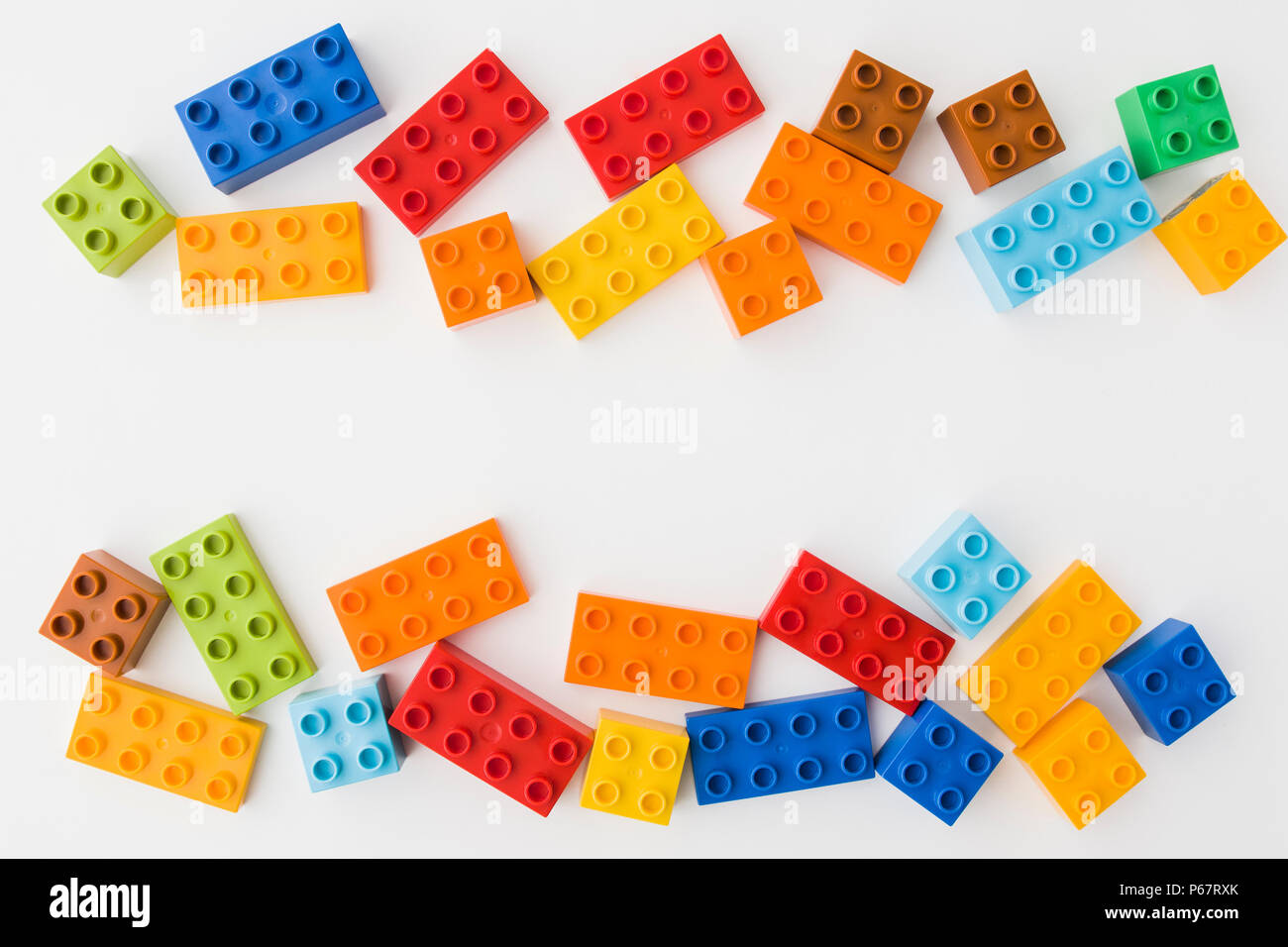 toy bricks of assorted colors on white background Stock Photo