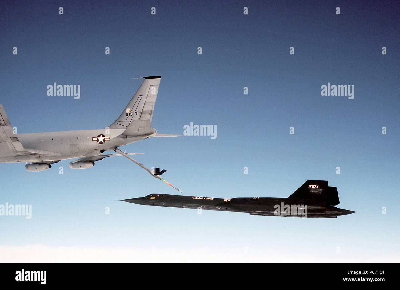 Photograph of a Boeing KC-135Q Stratotanker (59-1513) refuelling an Lockheed SR-71 (61-7974). Dated 1983 Stock Photo