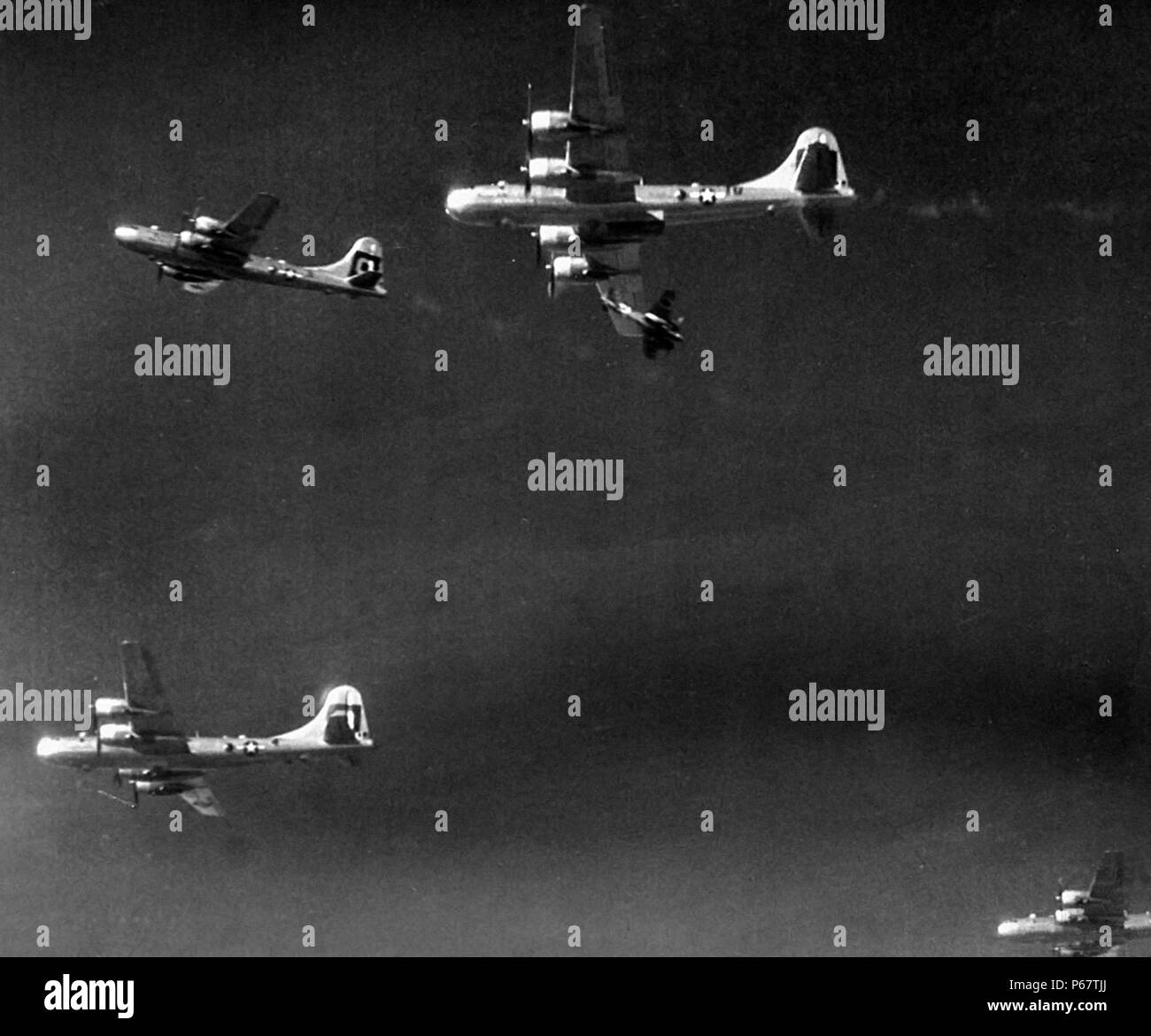 Photograph of Japanese Ki-46 attacking American Boeing B-29s over Japan. Dated 1945 Stock Photo