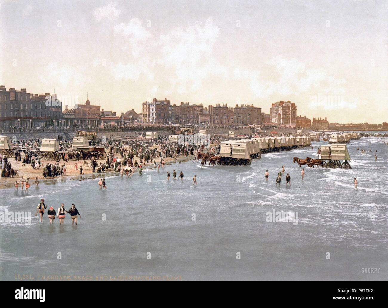 Colour photochrom of a beach and ladies' bathing place in England. Dated 1895 Stock Photo