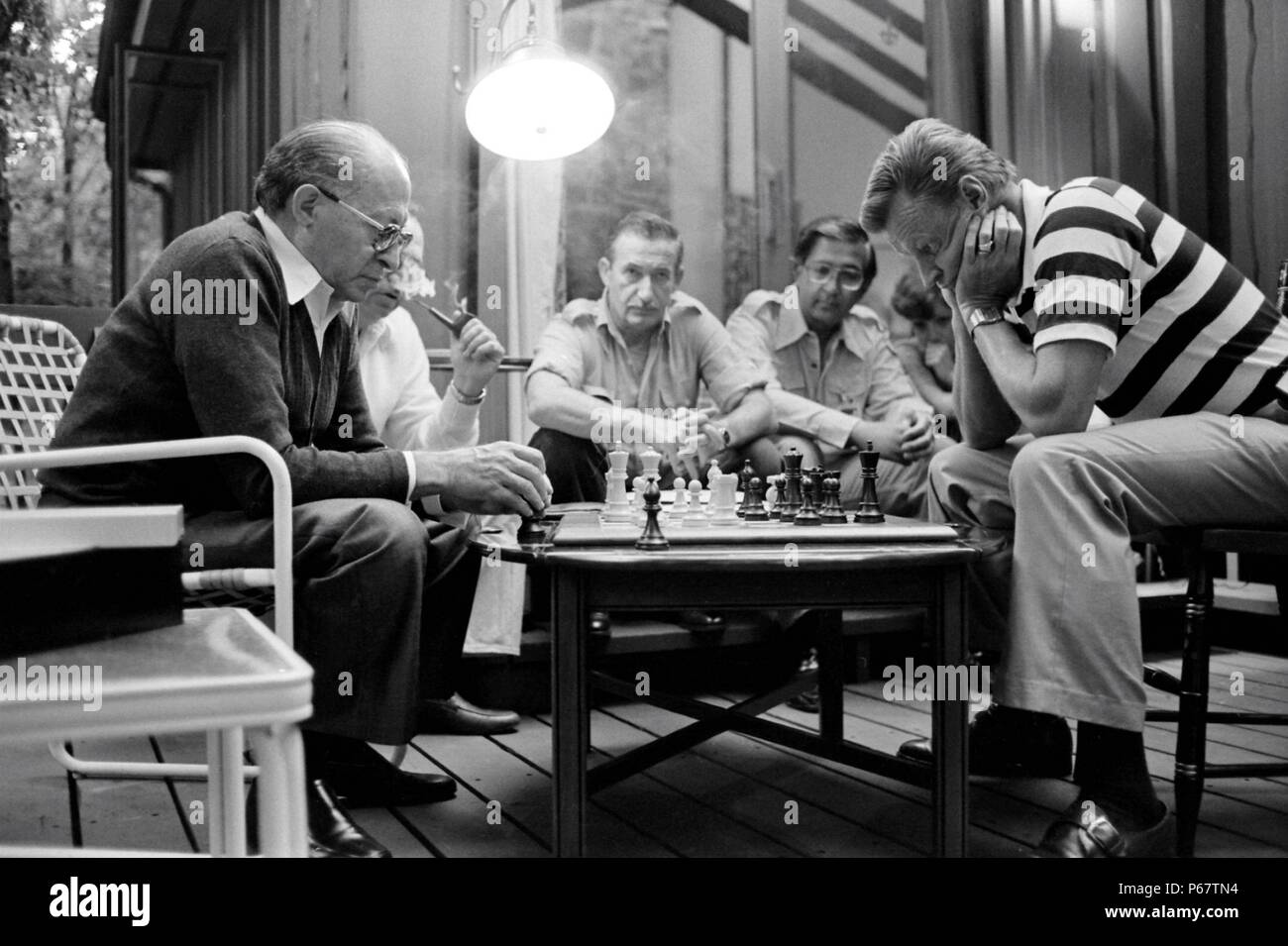 Photograph of Israeli Prime Minister Menachem Begin (1913-1992) and United States National Security Advisor Zbigniew Brzezinski (1928 - ) playing chess at Camp David. Dated 1978 Stock Photo