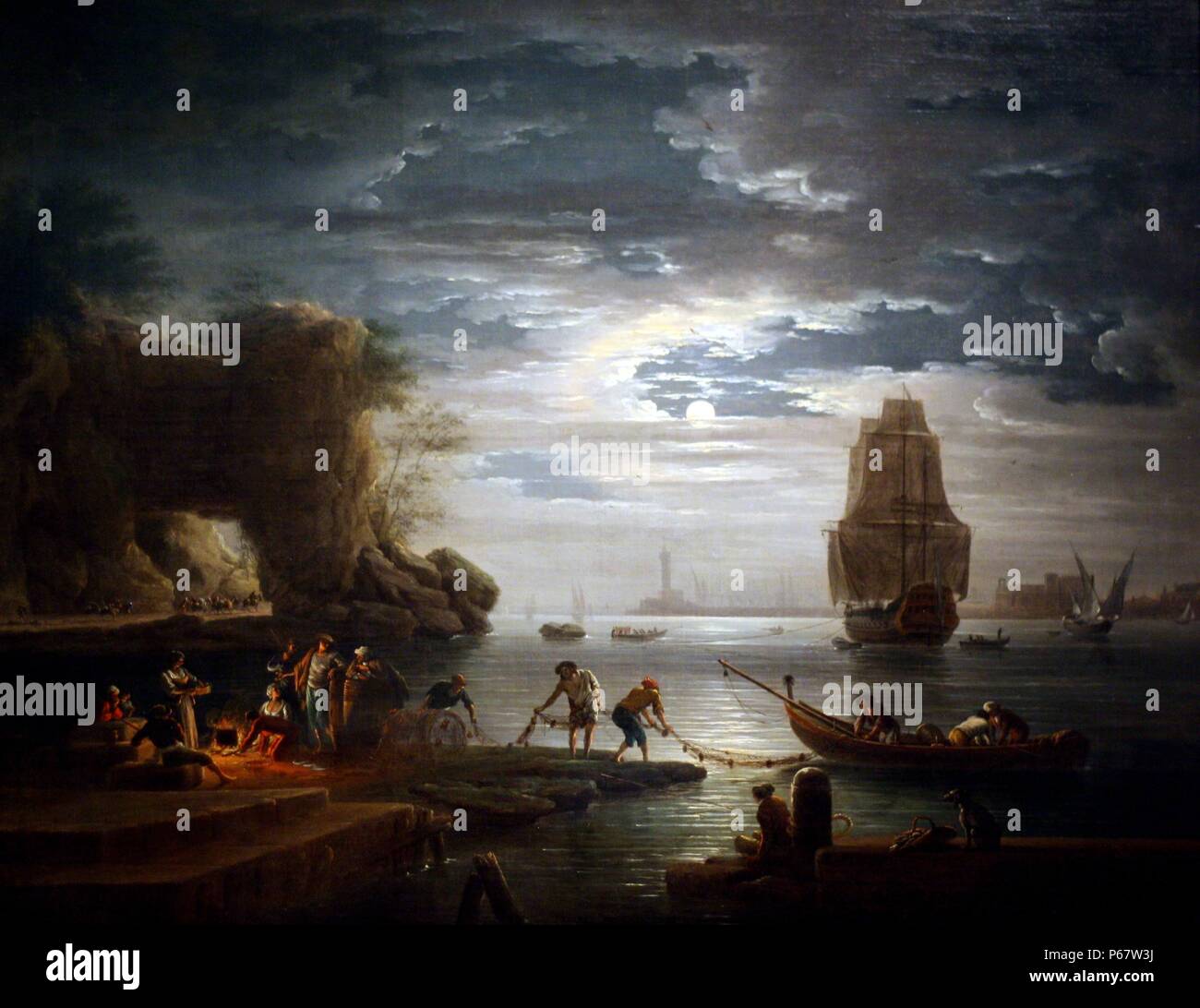 Coastal Scene by Claude-Joseph Vernet (1714-1789).  Oil on canvas.  This nocturnal seascape recalls the rocky coastline near Naples.  In contrasting scenes representing Morning, Noon, Evening and Night, Vernet combined idealized views with carefully observed lightning and  weather conditions. Stock Photo