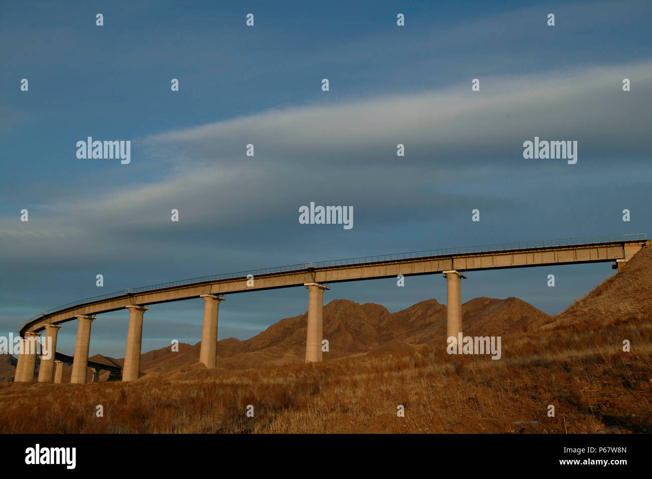 The fabled curved viaduct at Simingyi on the Jing Peng section of the Ji-Tong Railway in Inner Mongolia was one of the worlds finest photographic loca Stock Photo